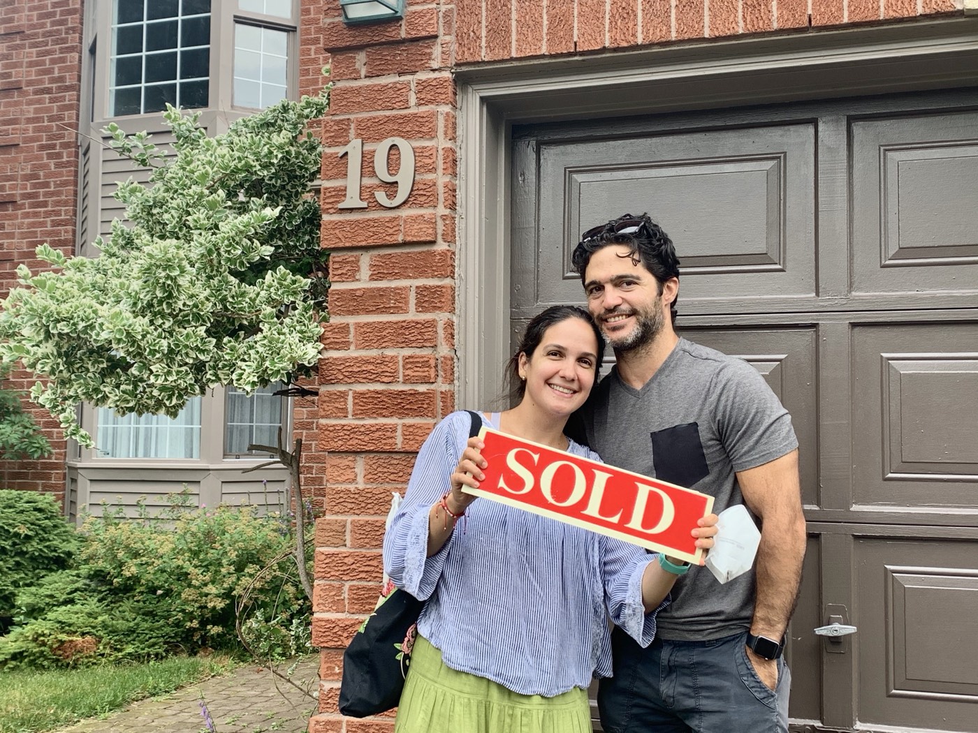 Happy clients on closing day in Lakeside with Laura McBride, Ajax REALTOR&reg;