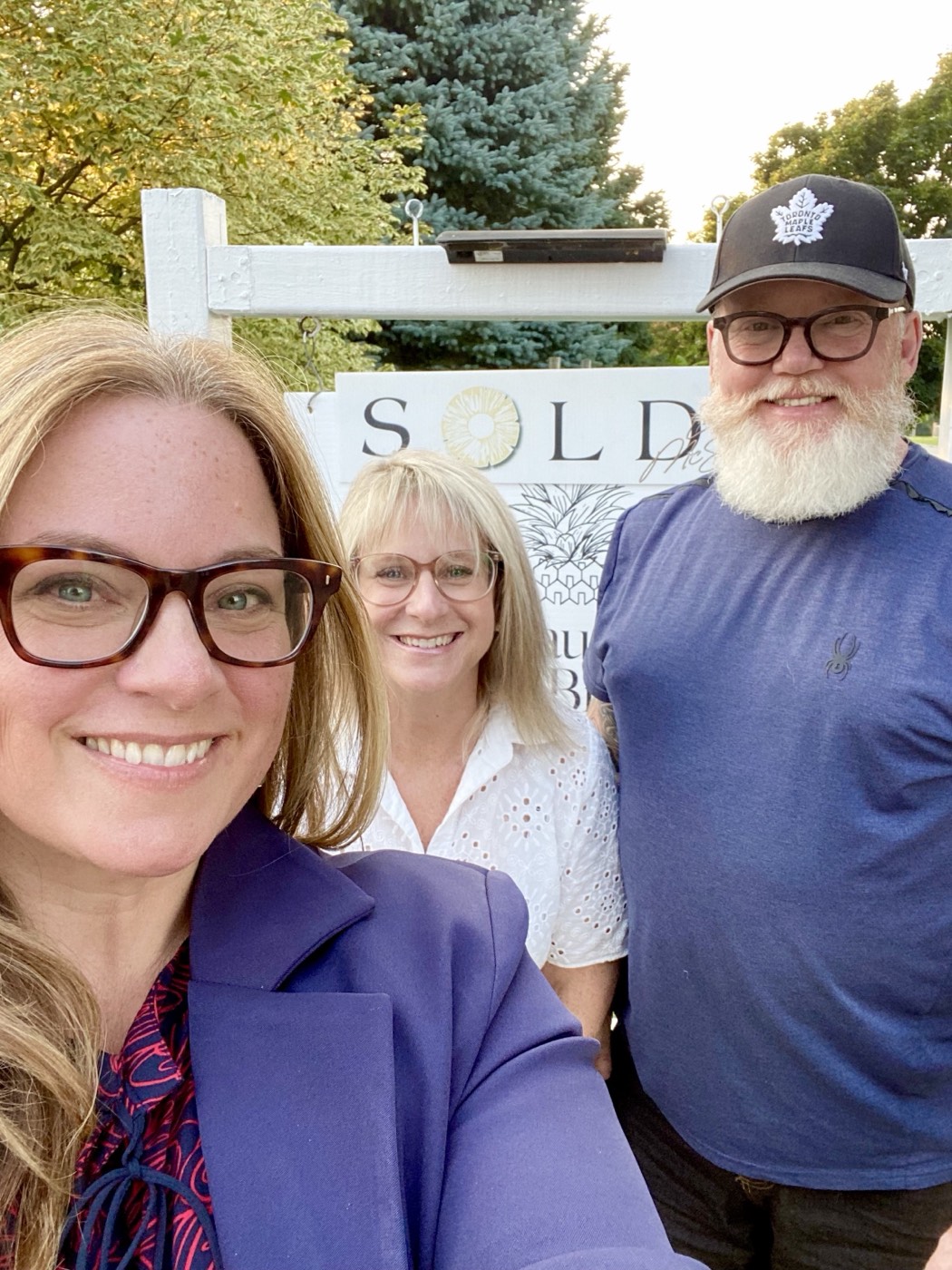 A Courtice family celebrating their move with Laura McBride, REALTOR&reg;