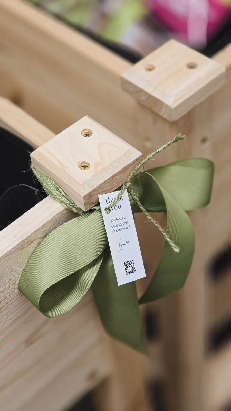 A Junior Green Thumbs classroom garden tied with a ribbon and a handwritten thank-you tag from Laura McBride
