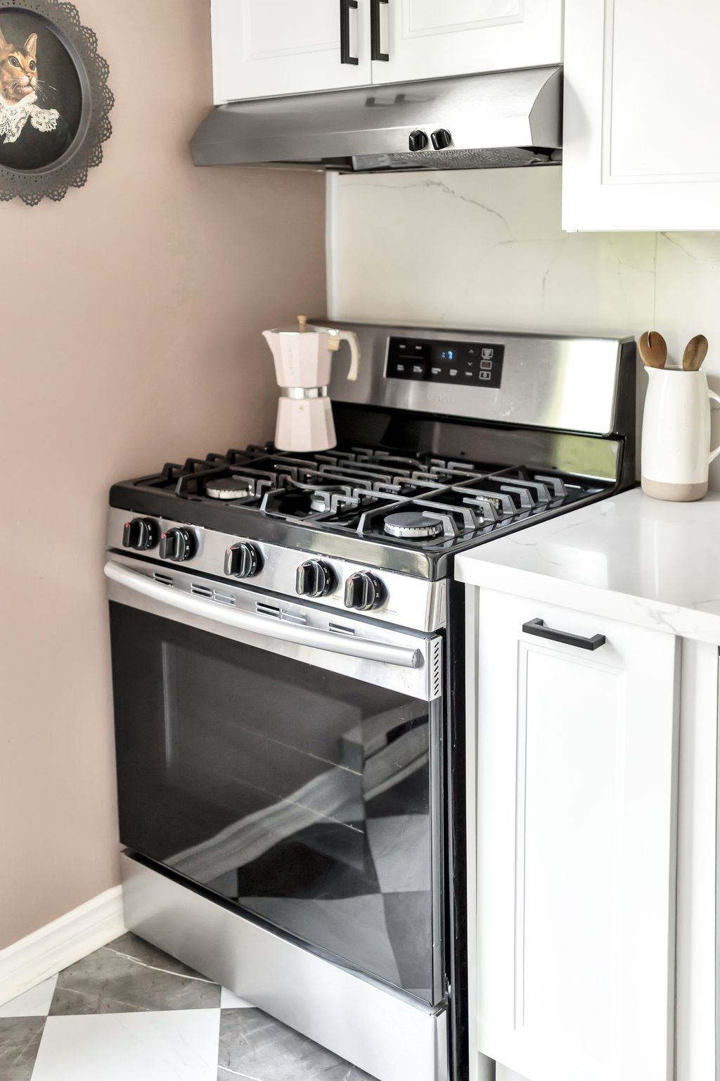 Gas stove detail in the renovated kitchen at 10-765 Oklahoma Dr, Pickering