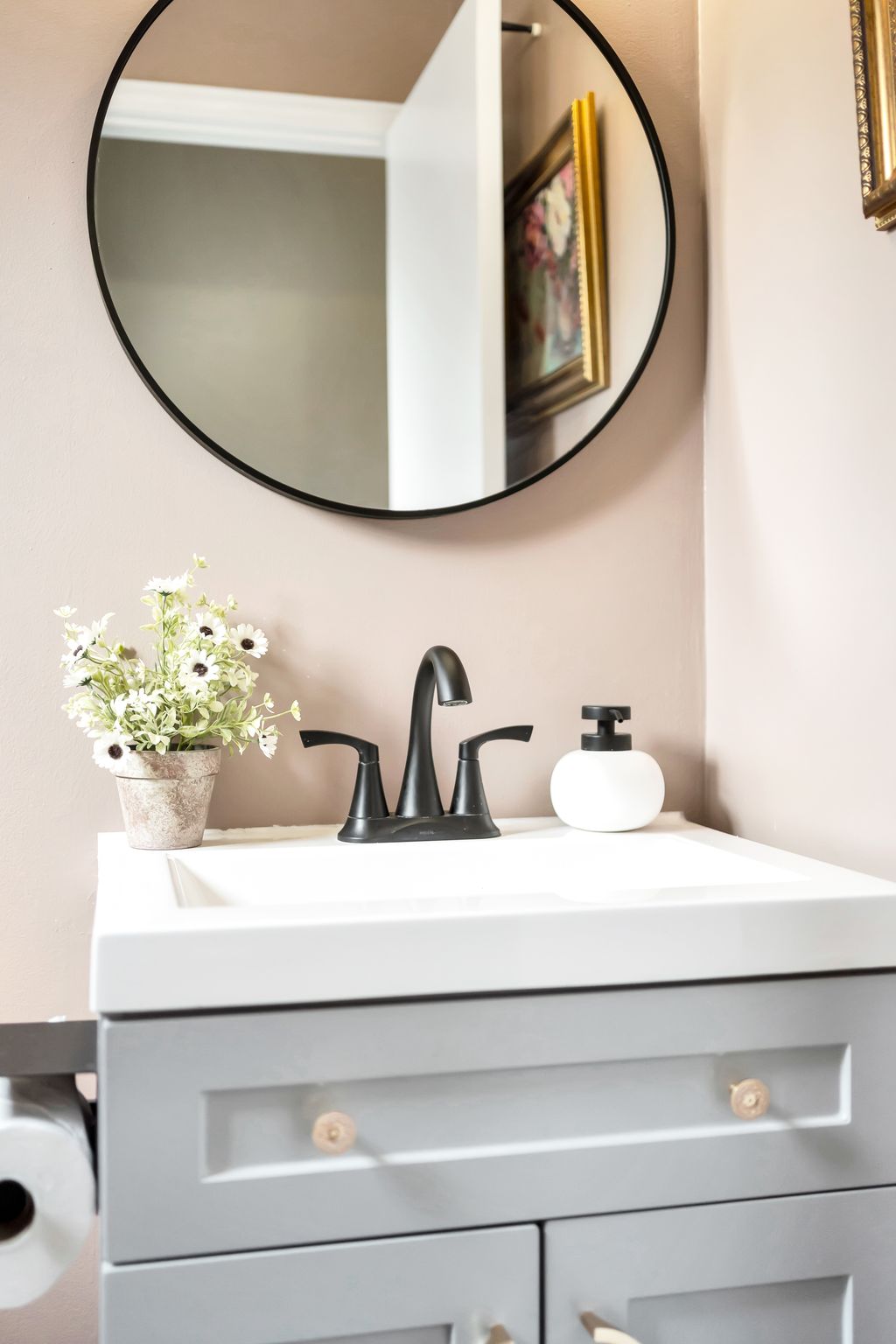 Powder room on the mid-level landing at 10-765 Oklahoma Dr, Pickering
