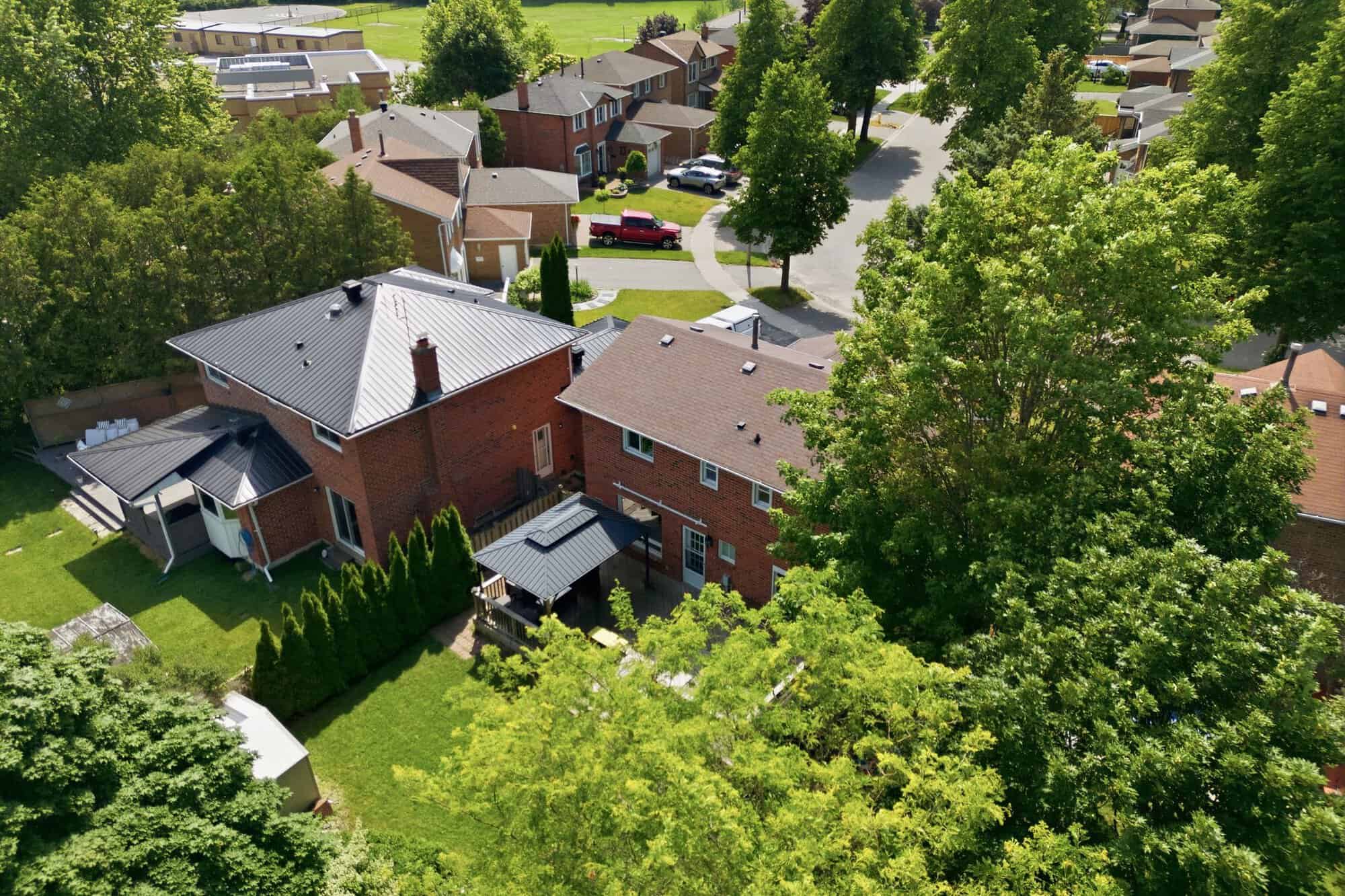 Treetop aerial view near 13 Flowers Crescent, South Ajax, showing proximity to Lake Ontario