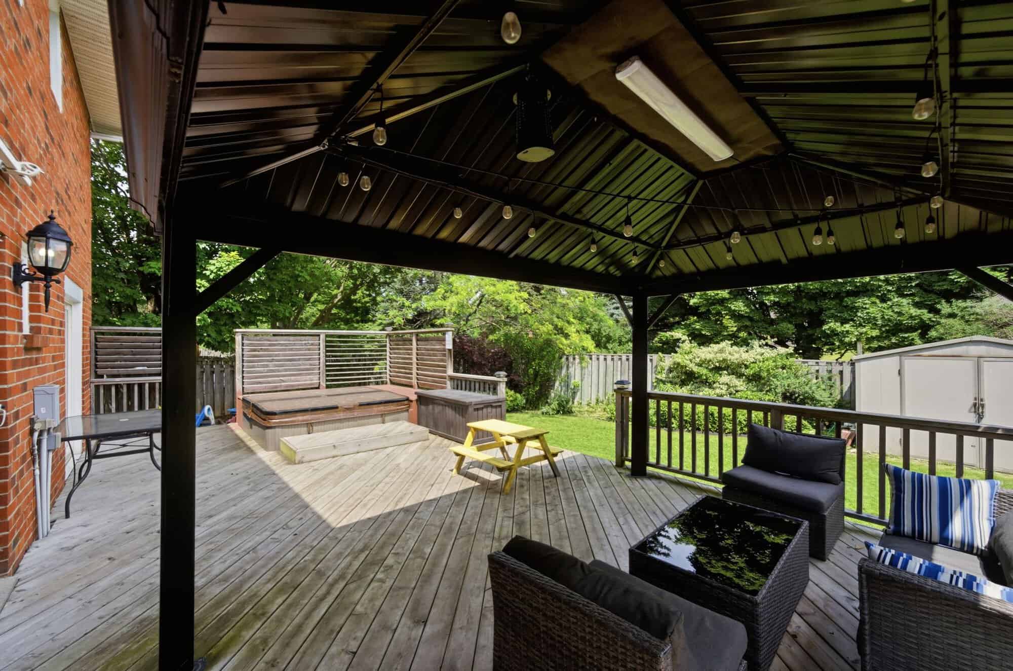 Hot tub in the private backyard at 13 Flowers Crescent, South Ajax