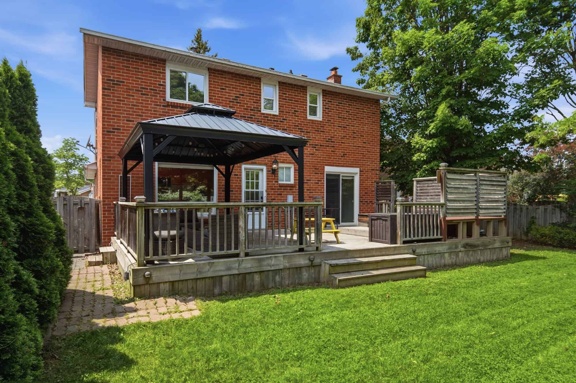 Fully fenced pie-shaped backyard at 13 Flowers Crescent, South Ajax, with no neighbours behind