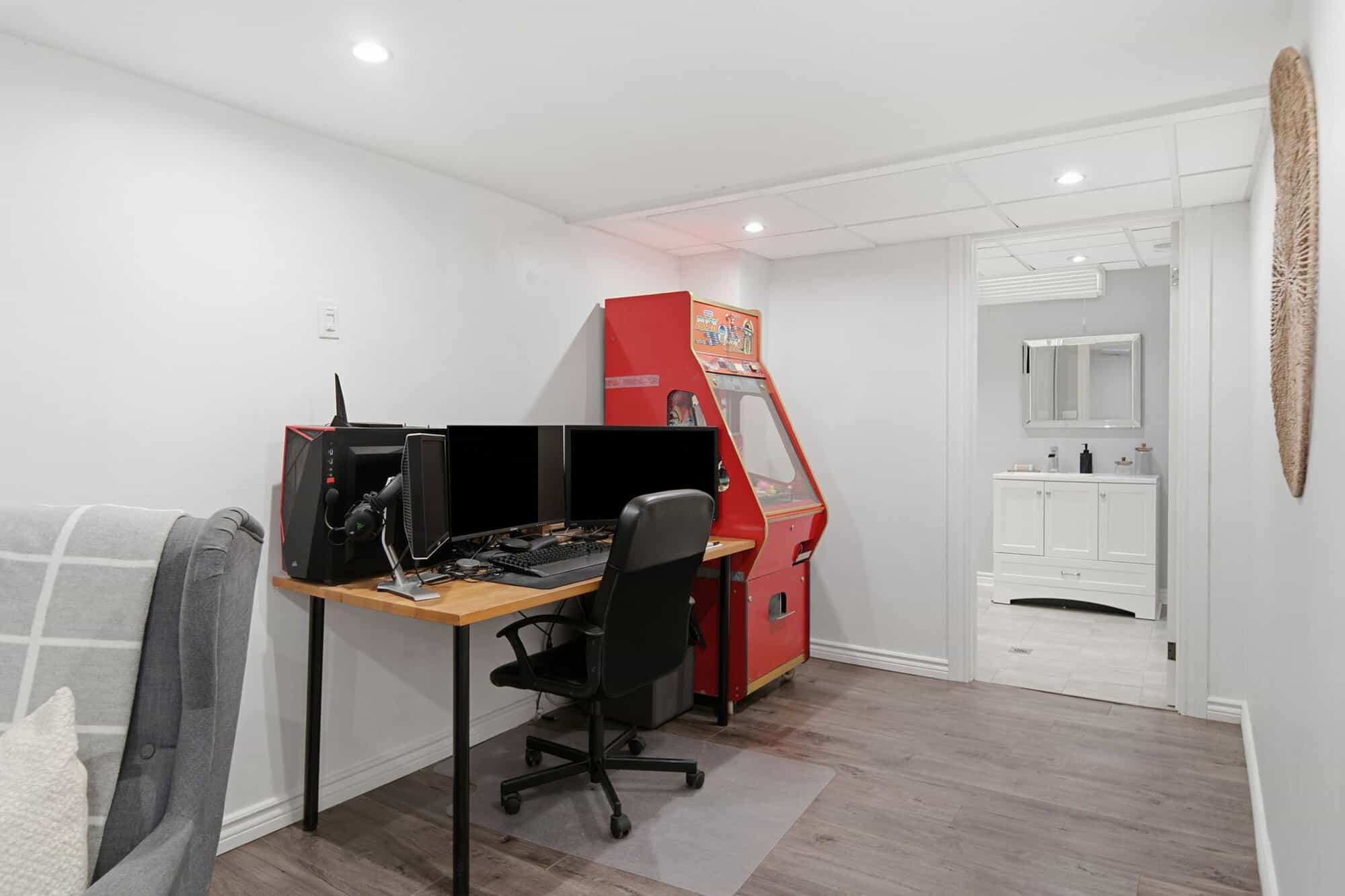 Basement detail at 13 Flowers Crescent, South Ajax, showing finishes in the combined rec and office space