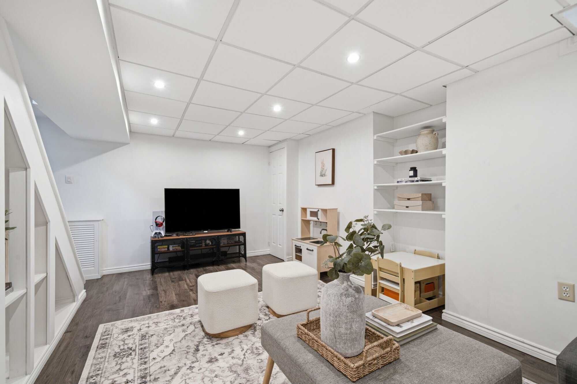 Basement recreation room at 13 Flowers Crescent, South Ajax, from a second angle