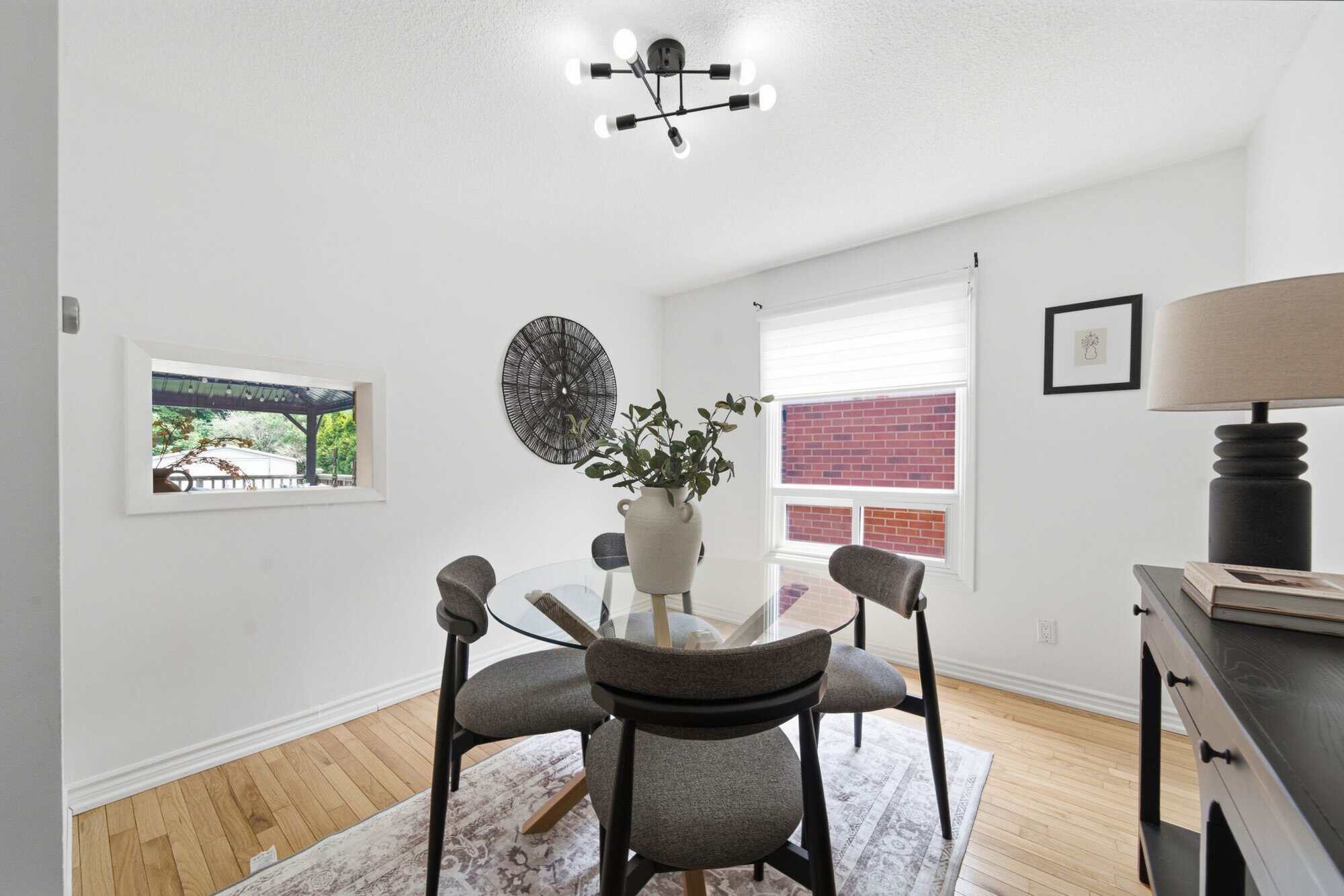 Dining room at 13 Flowers Crescent, South Ajax, showing the kitchen pass-through opening