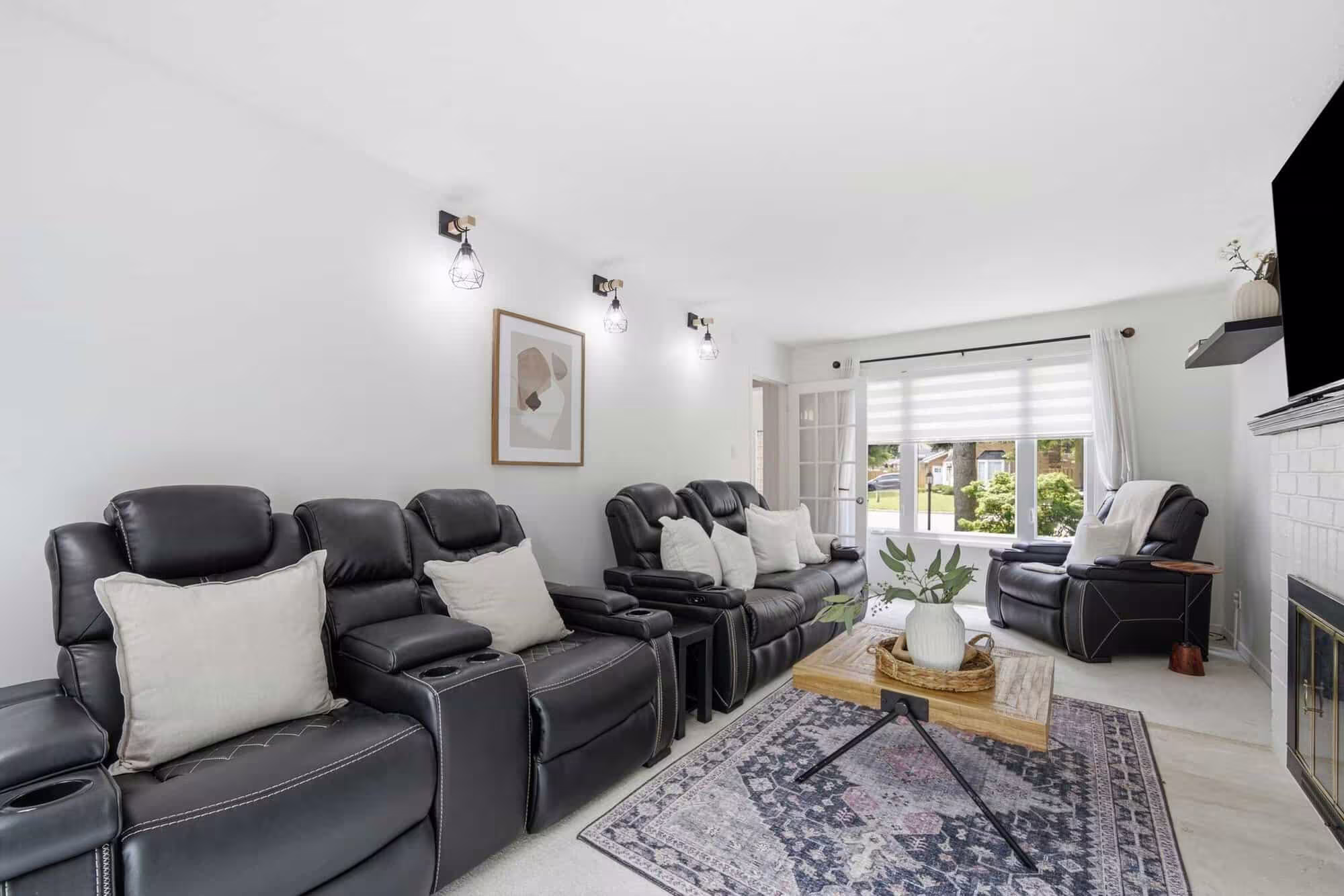 Living room detail at 13 Flowers Crescent, South Ajax, showing the fireplace surround and hardwood flooring