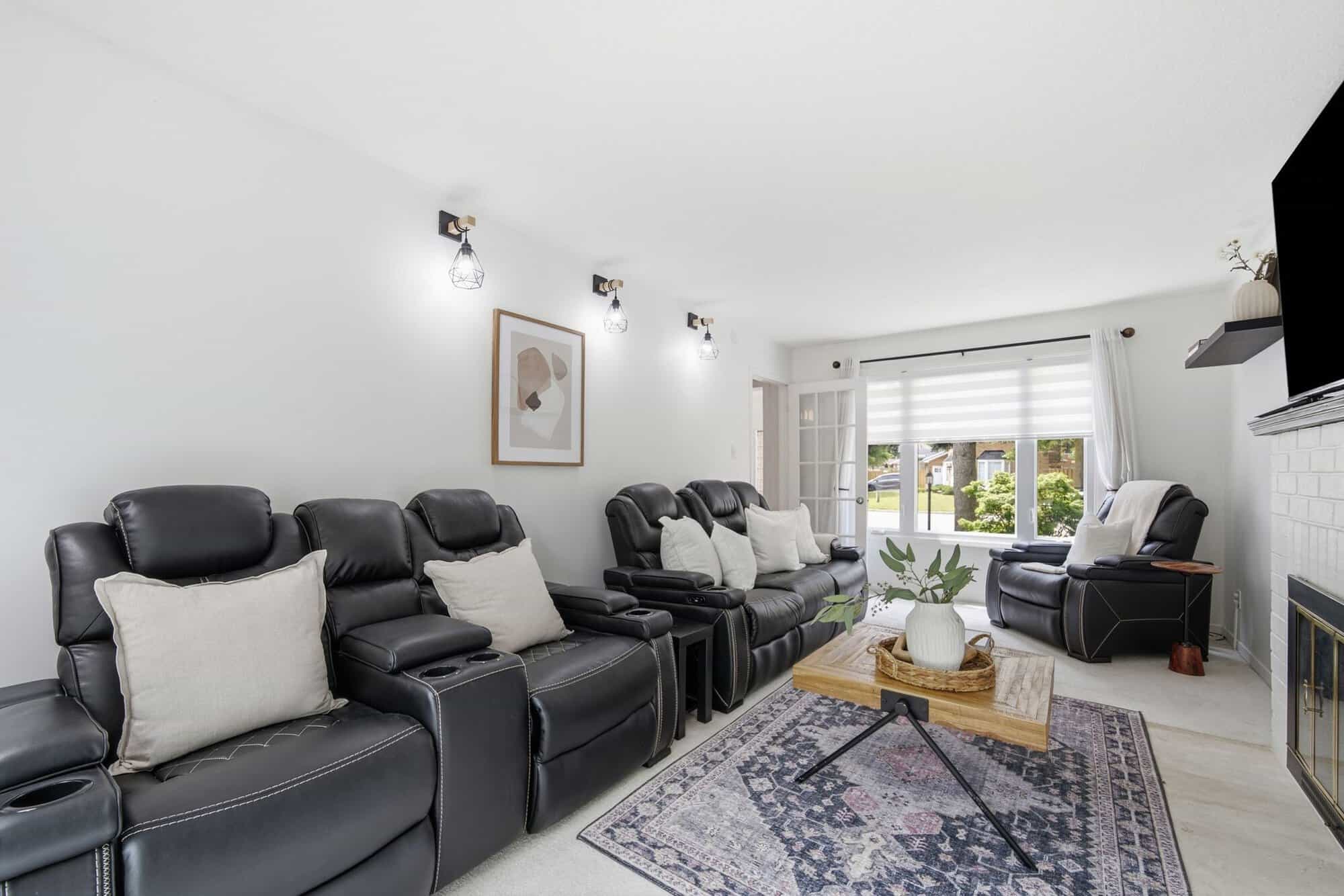 Living room detail at 13 Flowers Crescent, South Ajax, showing the fireplace surround and hardwood flooring