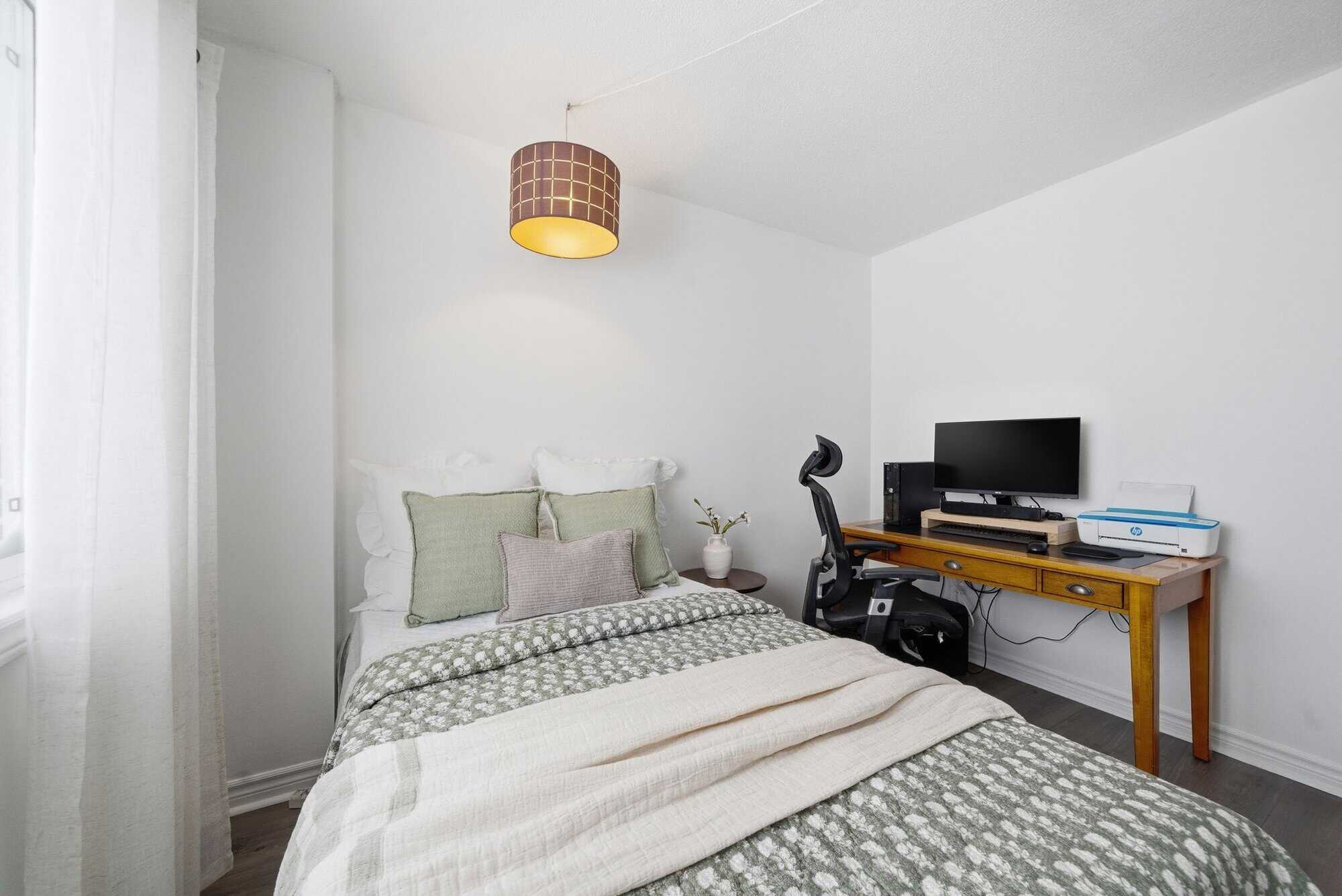Third bedroom at 13 Rollo Drive, South East Ajax, with a mirrored closet