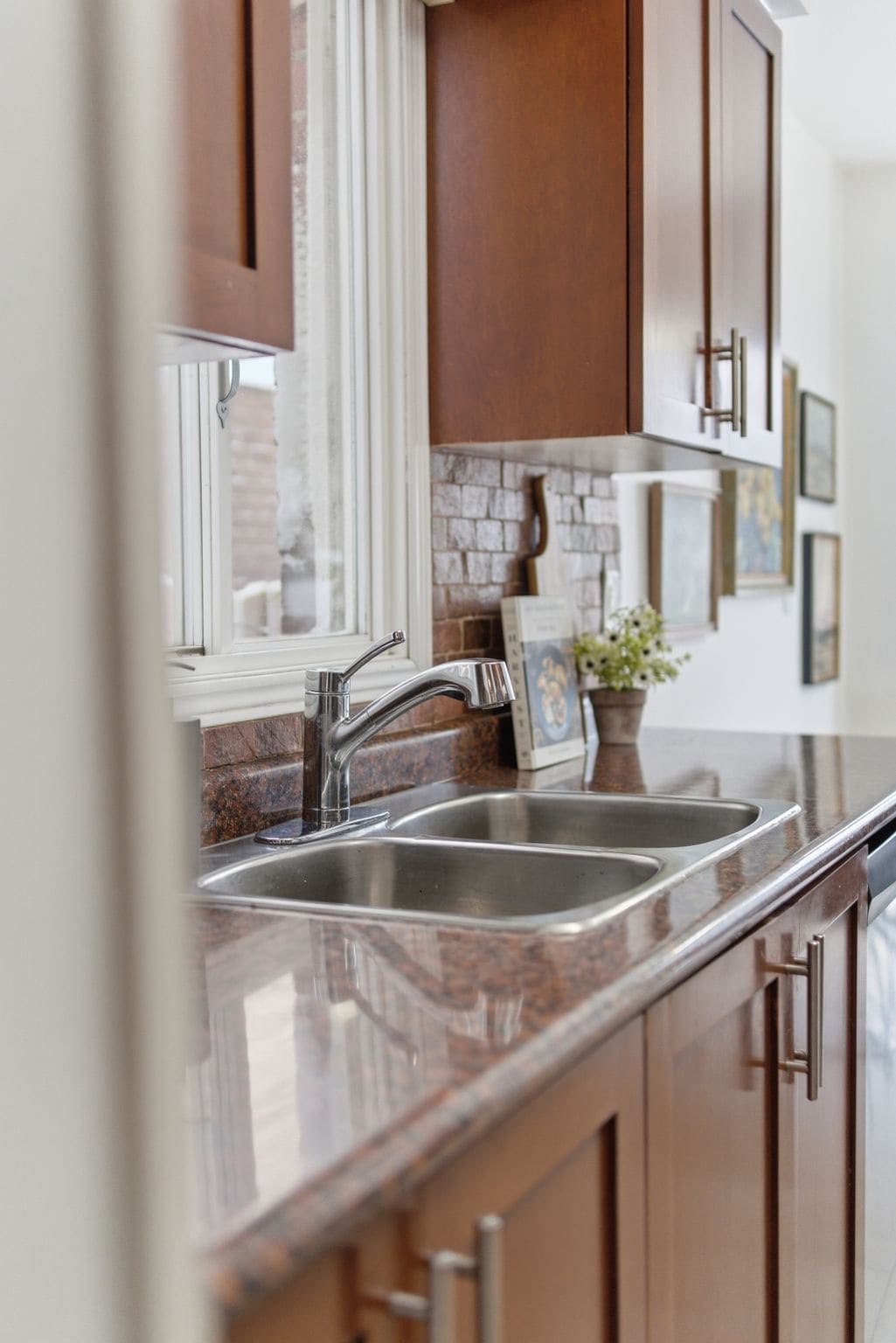 Kitchen sink with a window at 13 Rollo Drive, South East Ajax