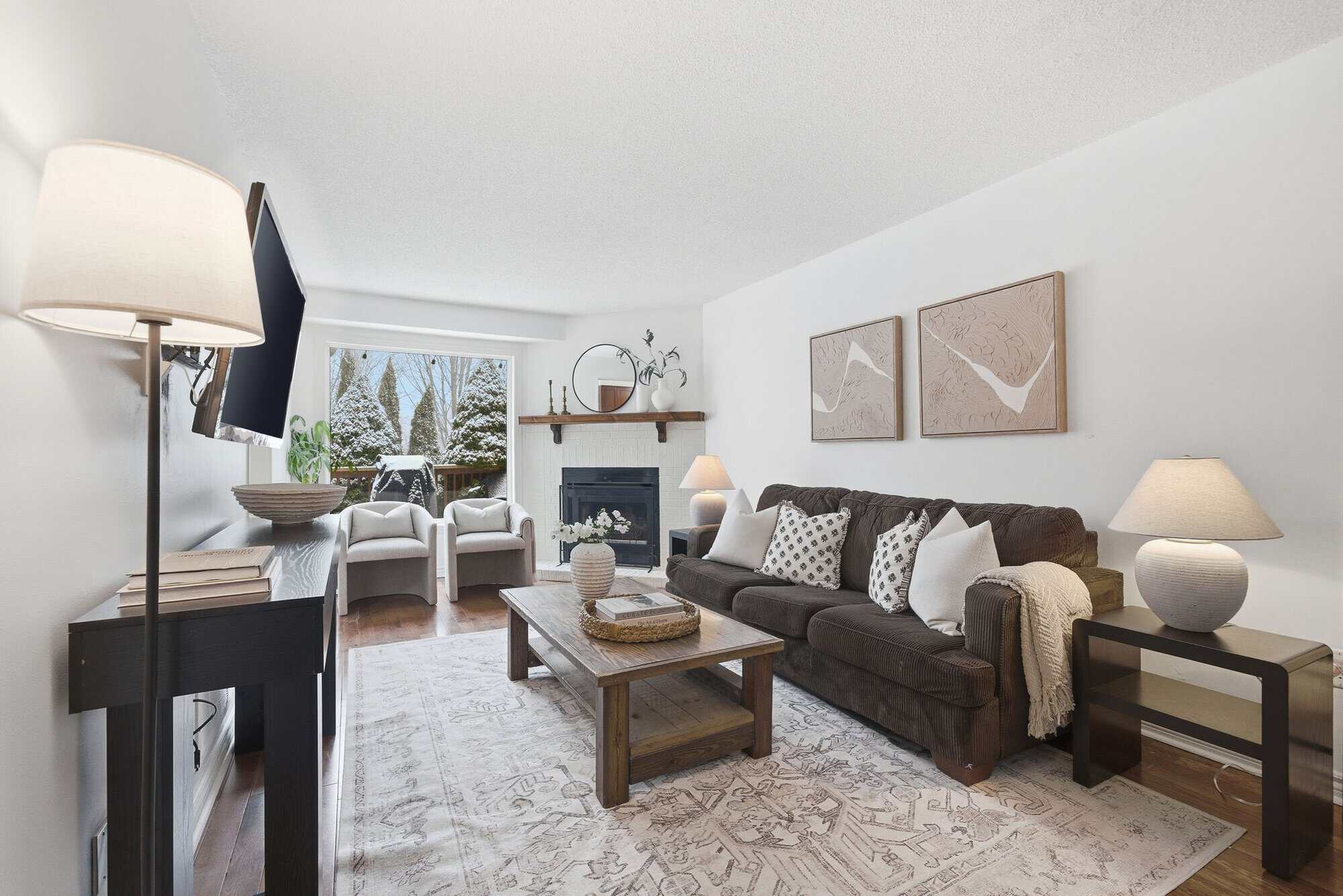 Living room at 13 Rollo Drive, South East Ajax, combined with the dining room, with a picture window