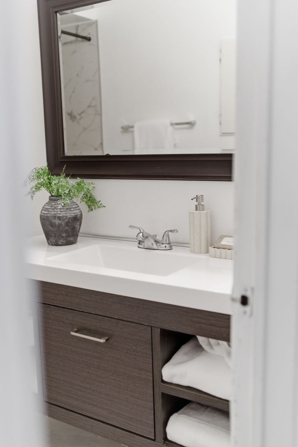 Updated main bathroom at 13 Rollo Drive, South East Ajax, with a solid surface trough sink