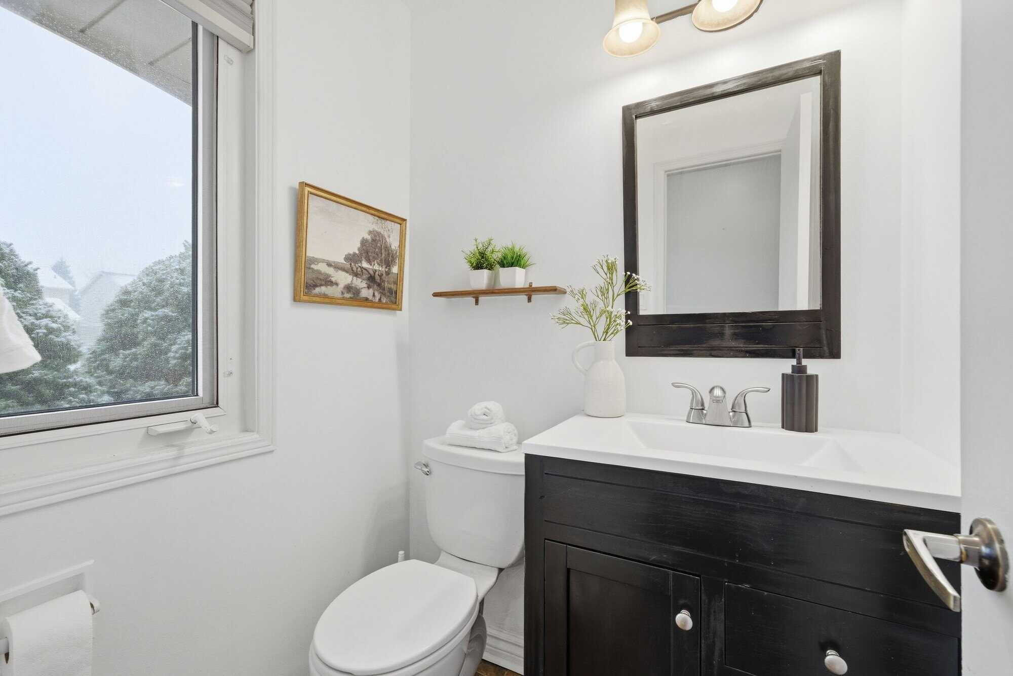 Main-floor powder room at 13 Rollo Drive, South East Ajax