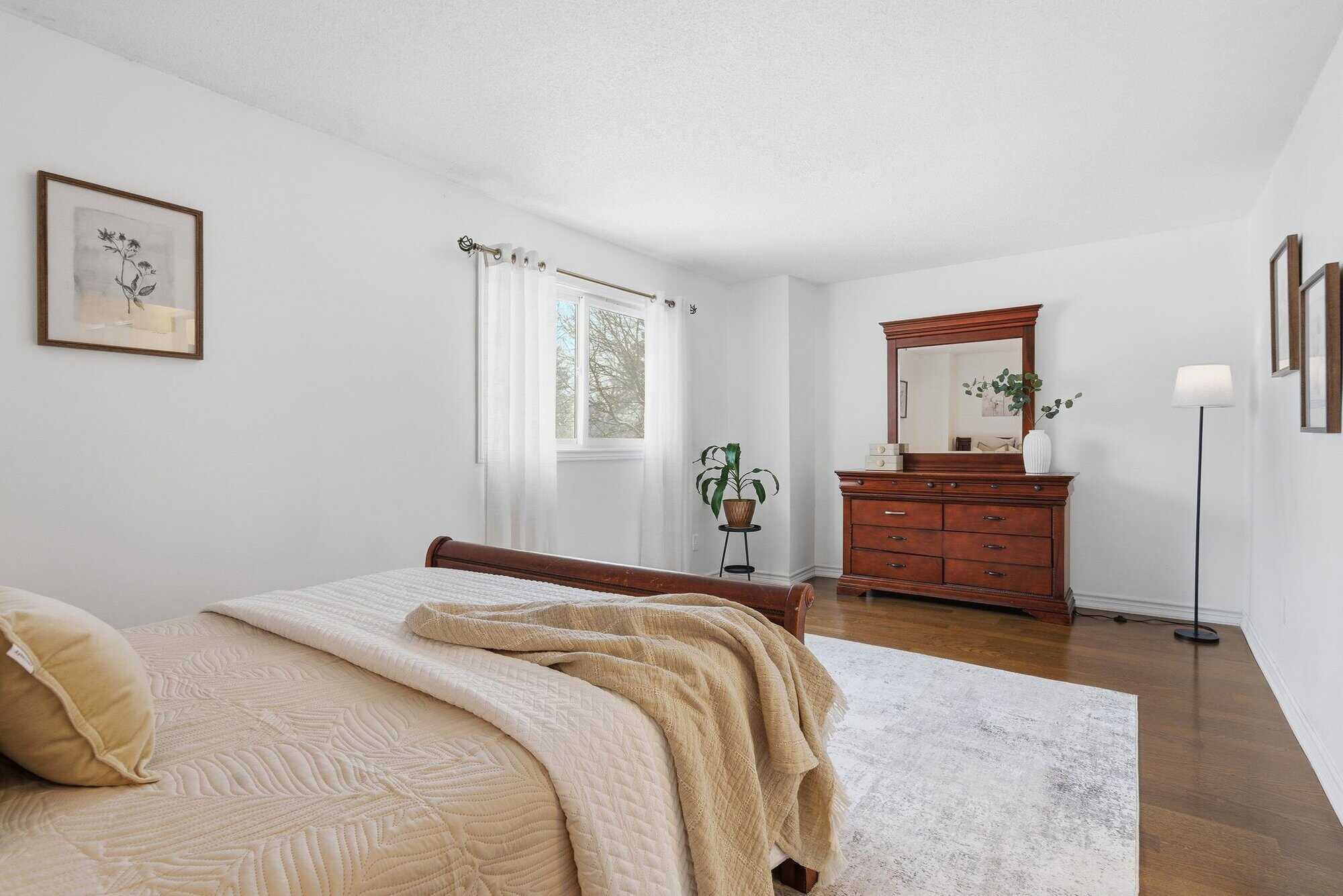 Primary bedroom at 13 Rollo Drive, South East Ajax, from a second angle
