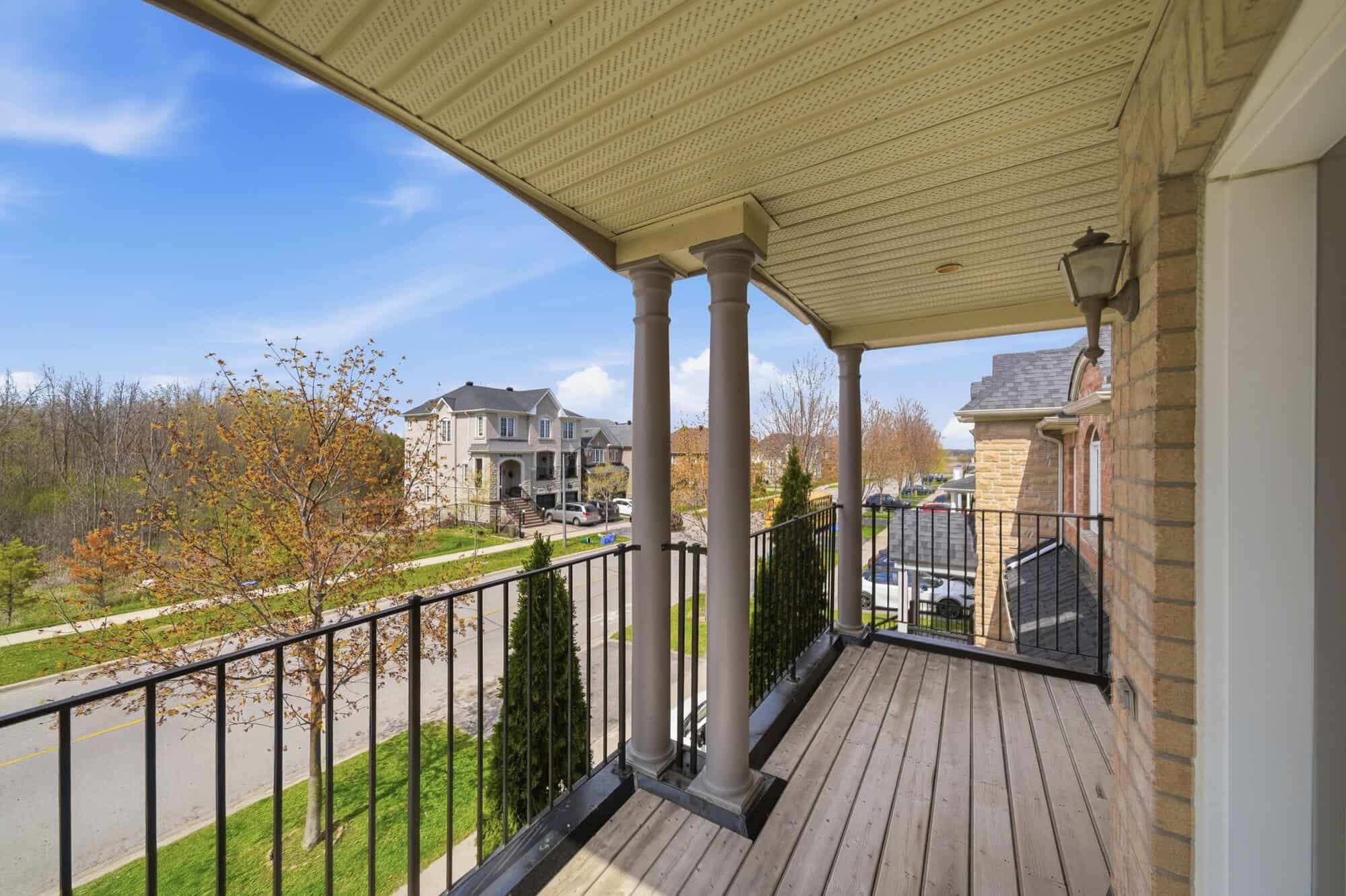 View from the upper covered balcony at 131 Rushworth Drive, Ajax, facing the woodland
