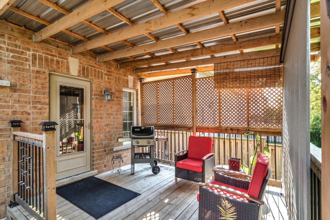 Deck at 14 Sleepy Hollow Place, Whitby, with a gazebo and outdoor dining area