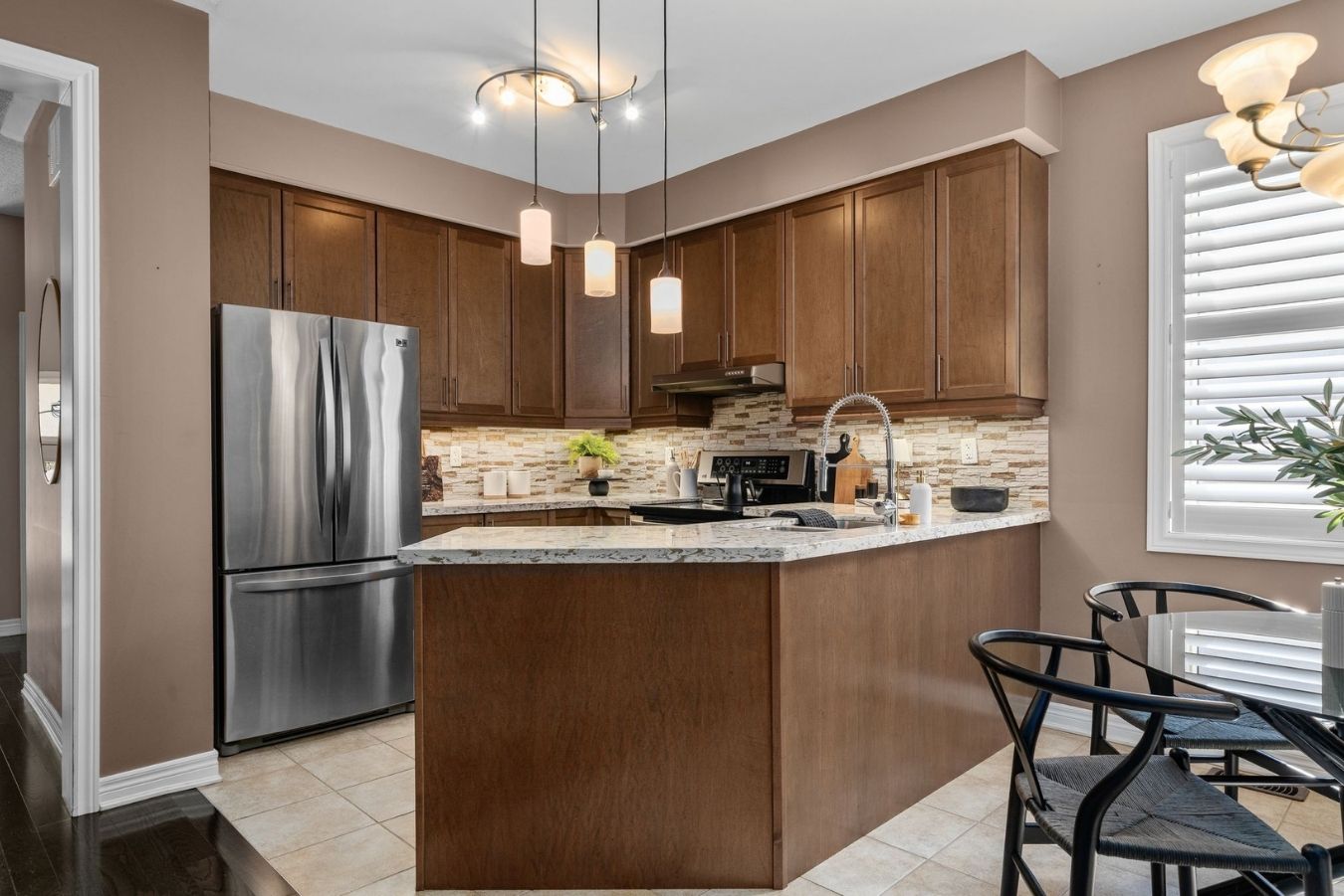 Kitchen at 14 Sleepy Hollow Place, Whitby, open to the front hall and dining area