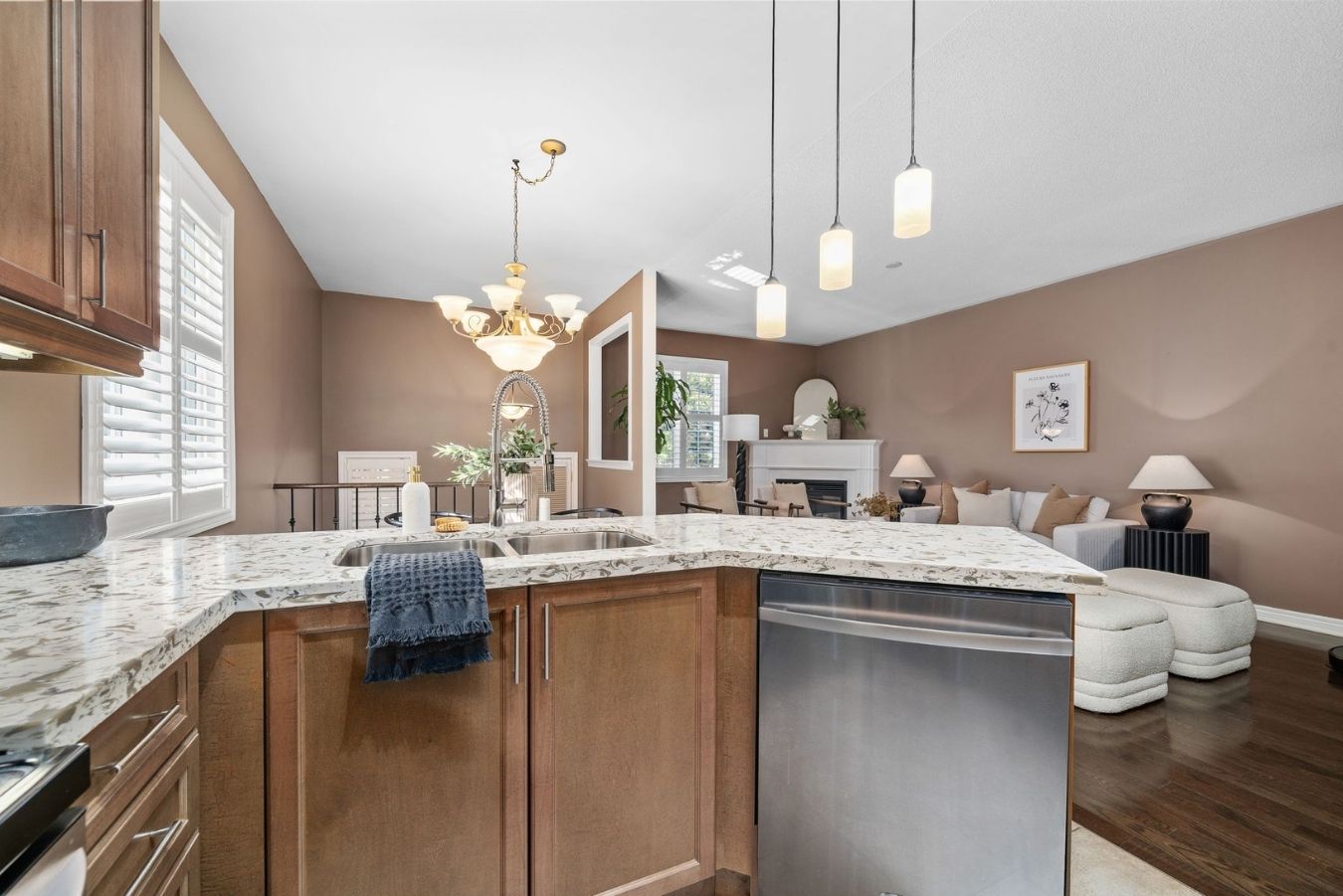 Kitchen at 14 Sleepy Hollow Place, Whitby, with maple cabinetry, granite counters and a centre island
