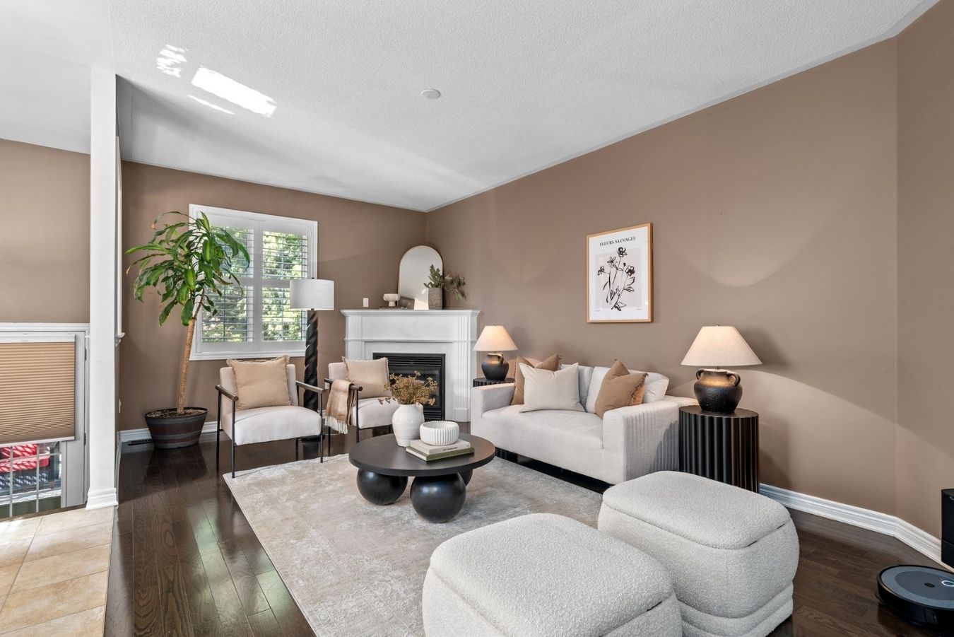 Living room at 14 Sleepy Hollow Place, Whitby, open to the kitchen and dining area, with hardwood floors