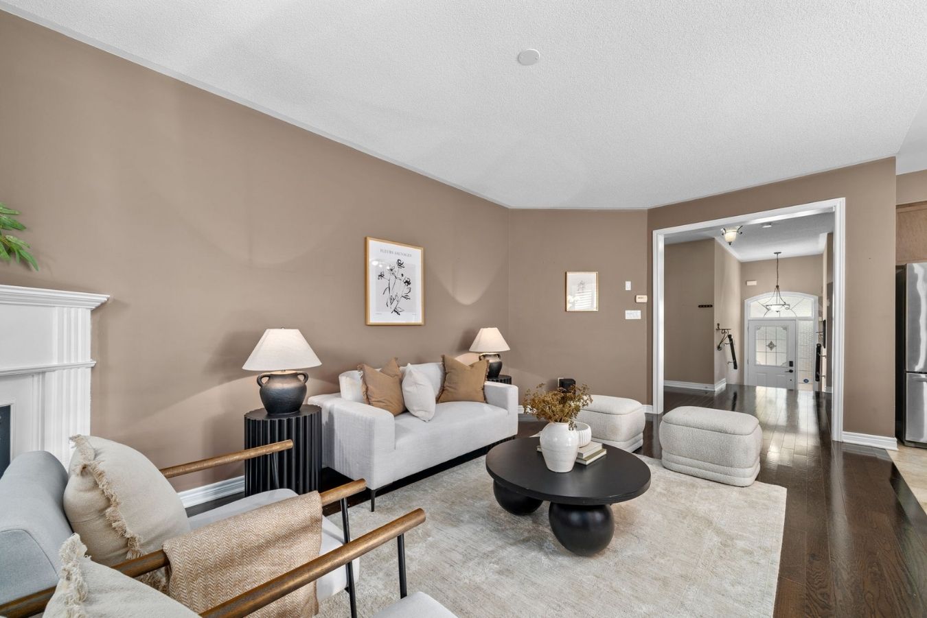 Living room at 14 Sleepy Hollow Place, Whitby, with a gas fireplace and hardwood floors