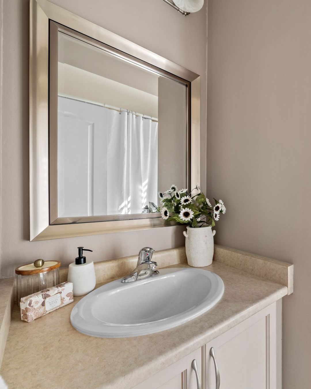 Main bathroom at 14 Sleepy Hollow Place, Whitby, with neutral finishes and California shutters