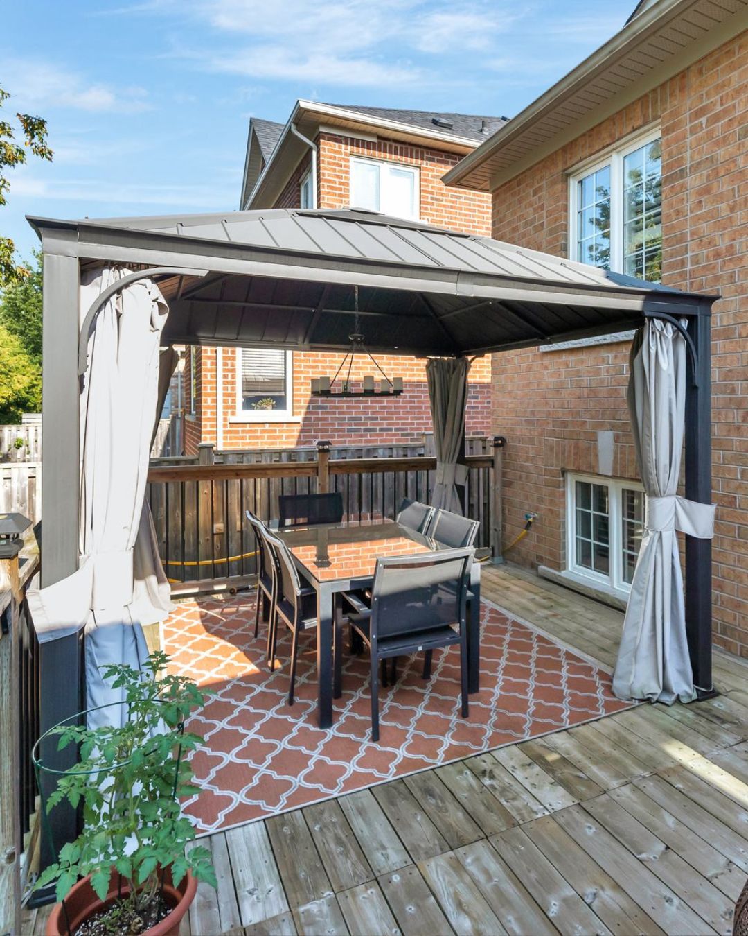 Outdoor dining area under the gazebo at 14 Sleepy Hollow Place, Whitby