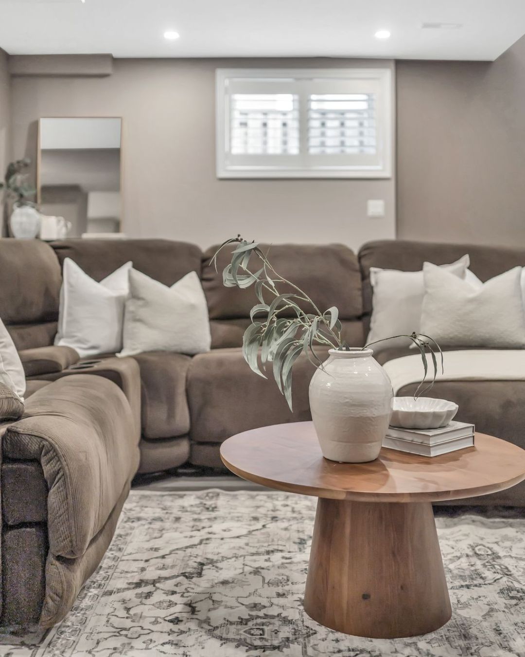 Recreation room seating area in the finished basement at 14 Sleepy Hollow Place, Whitby