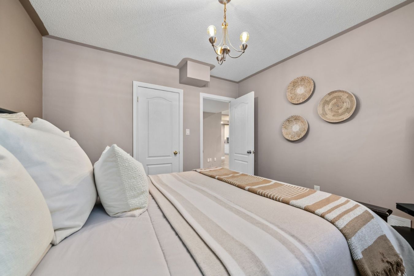 Third bedroom in the finished basement at 14 Sleepy Hollow Place, Whitby, with above-grade windows