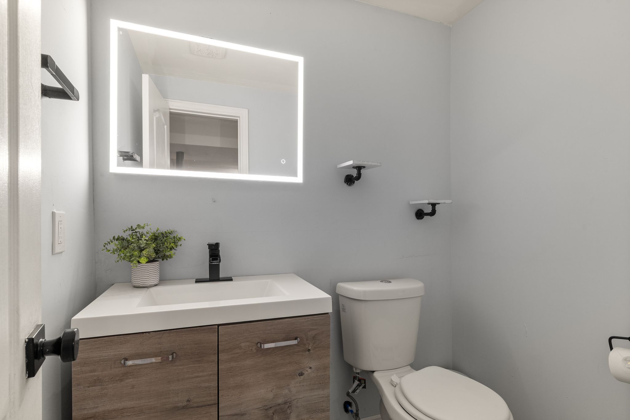 2-piece powder room in the finished basement at 1509 Grandview Street North, Oshawa