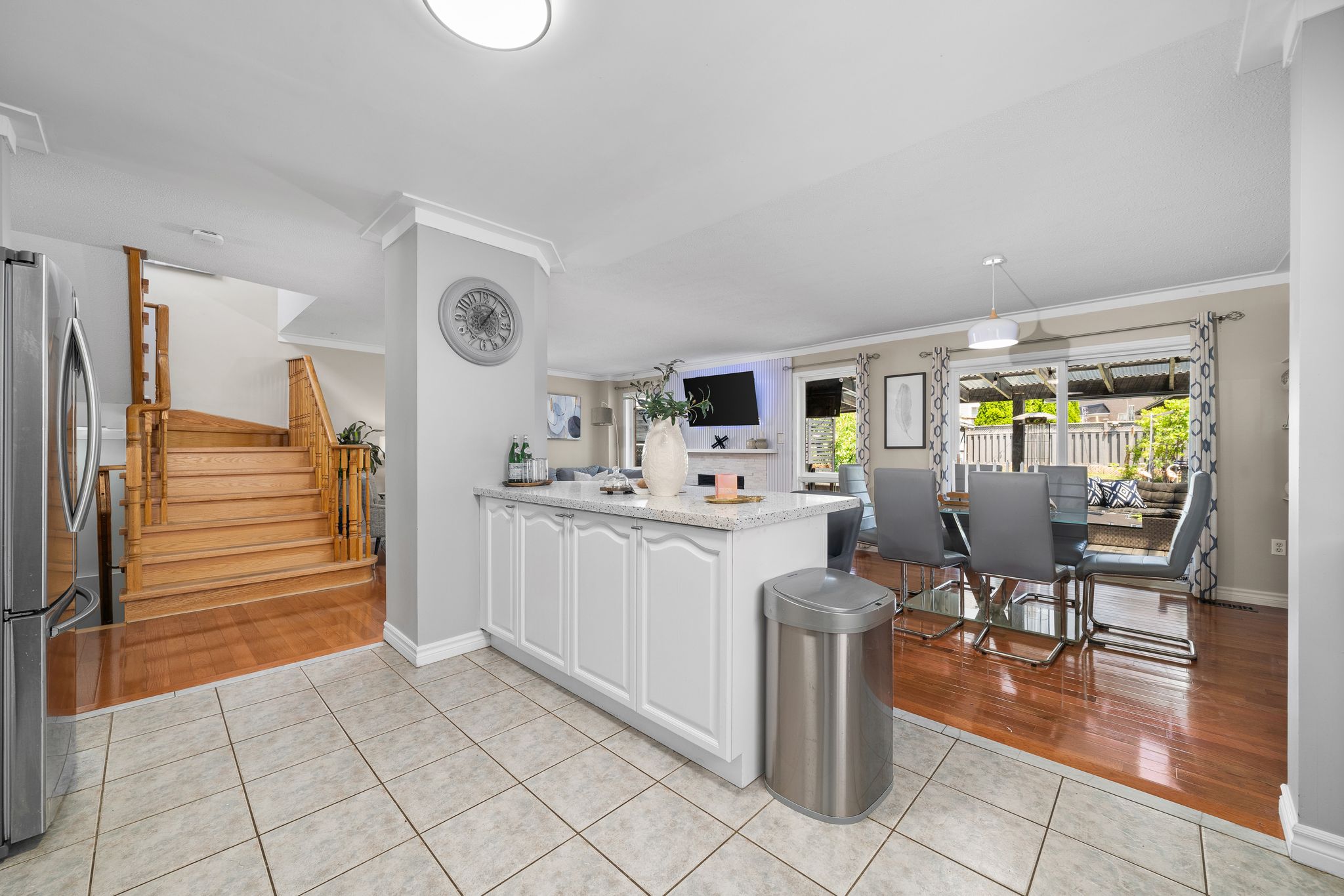Kitchen island at 1509 Grandview Street North, Oshawa, with quartz counters and bar seating