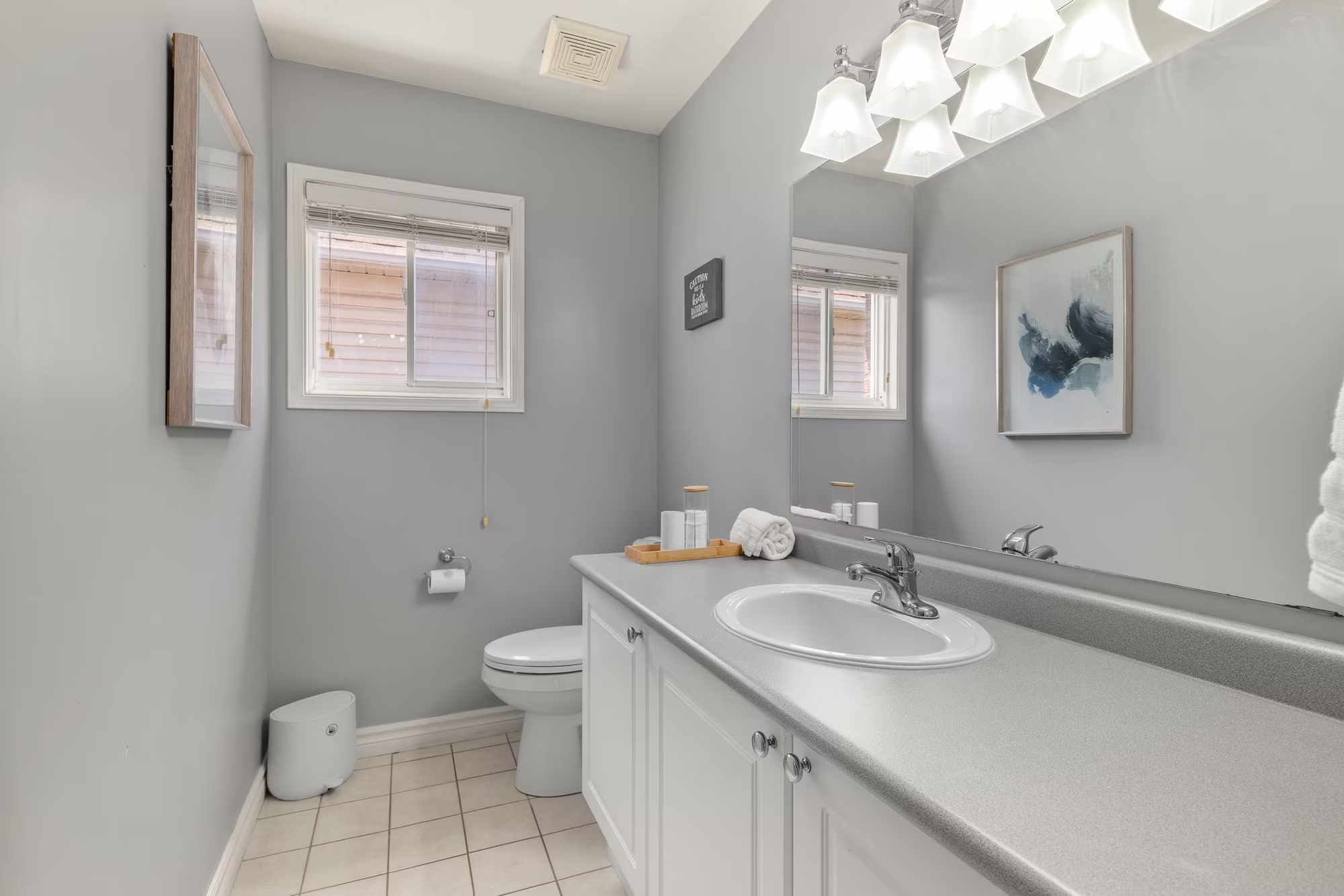 Main bathroom at 1509 Grandview Street North, Oshawa, with a glass walk-in shower and new lighting