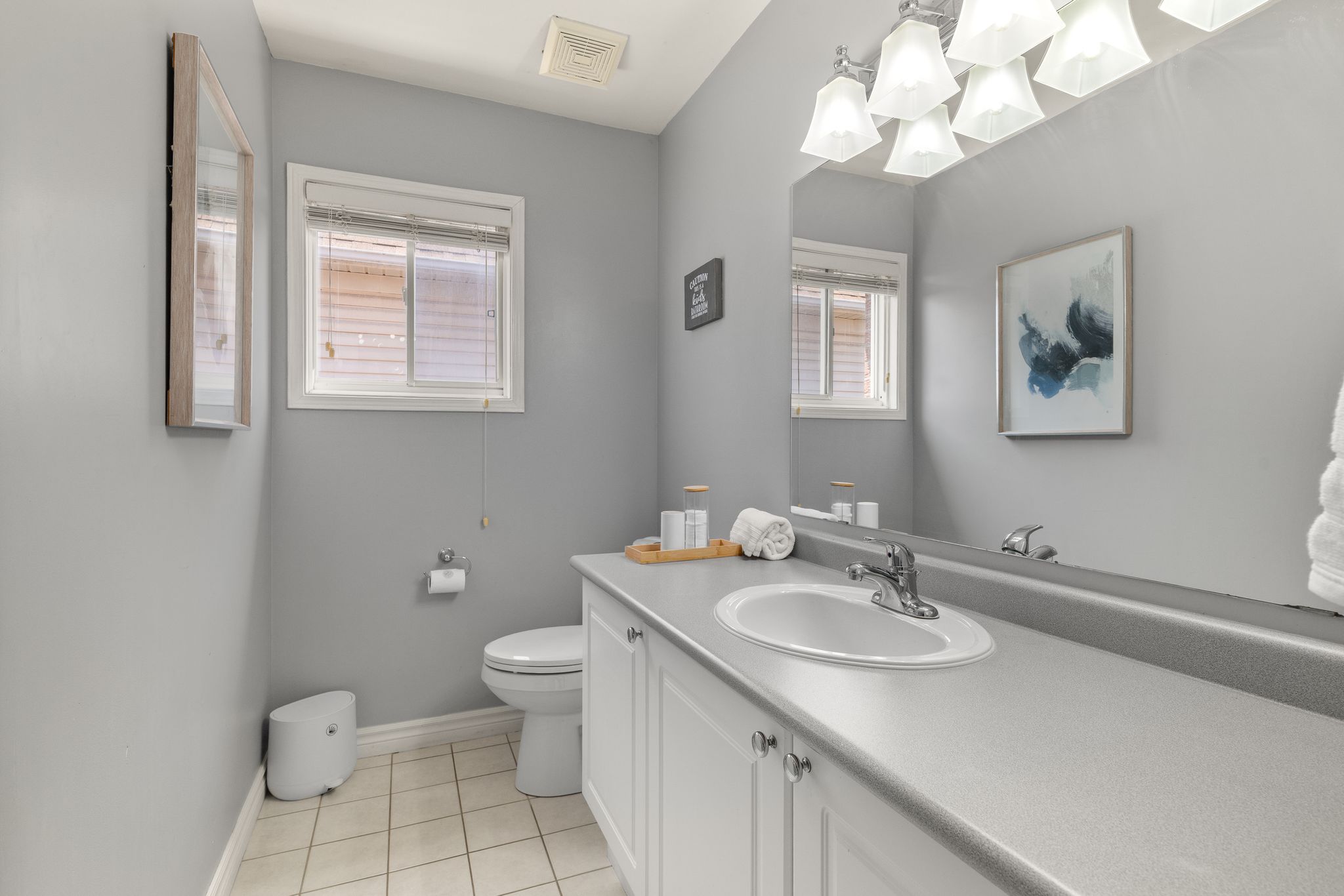 Main bathroom at 1509 Grandview Street North, Oshawa, with a glass walk-in shower and new lighting