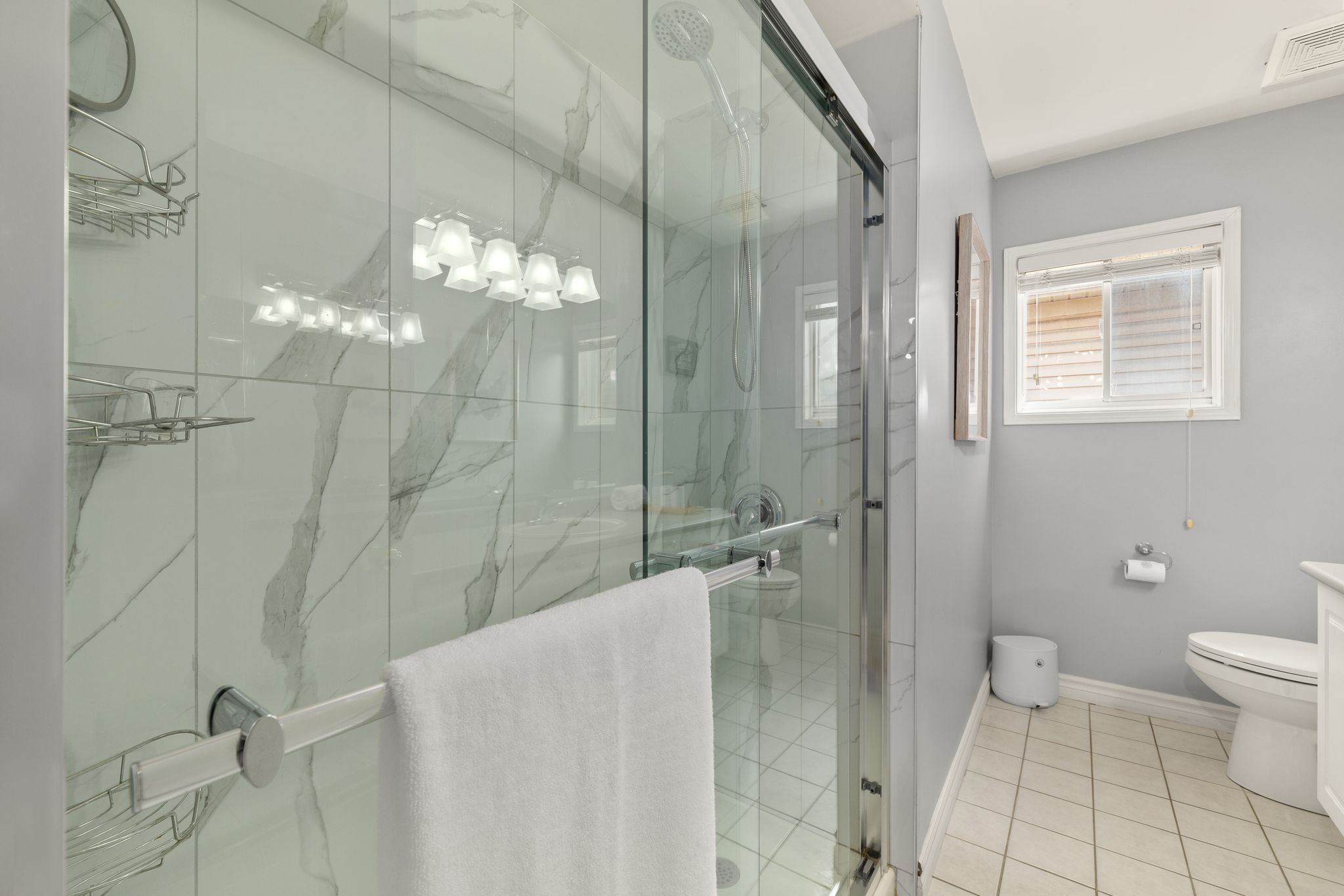Glass walk-in shower detail in the main bathroom at 1509 Grandview Street North, Oshawa