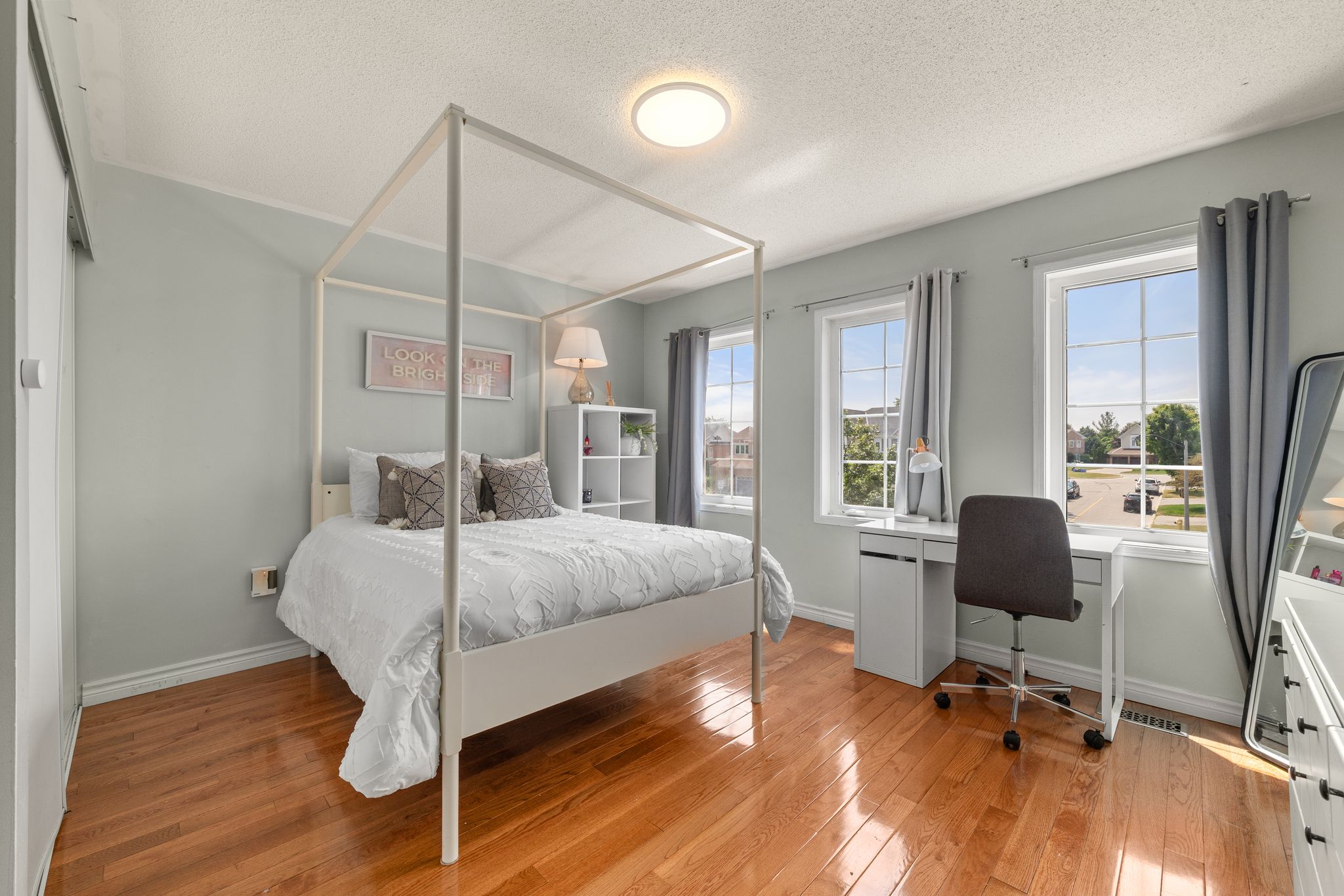 Second bedroom at 1509 Grandview Street North, Oshawa, spacious with double windows and a desk area