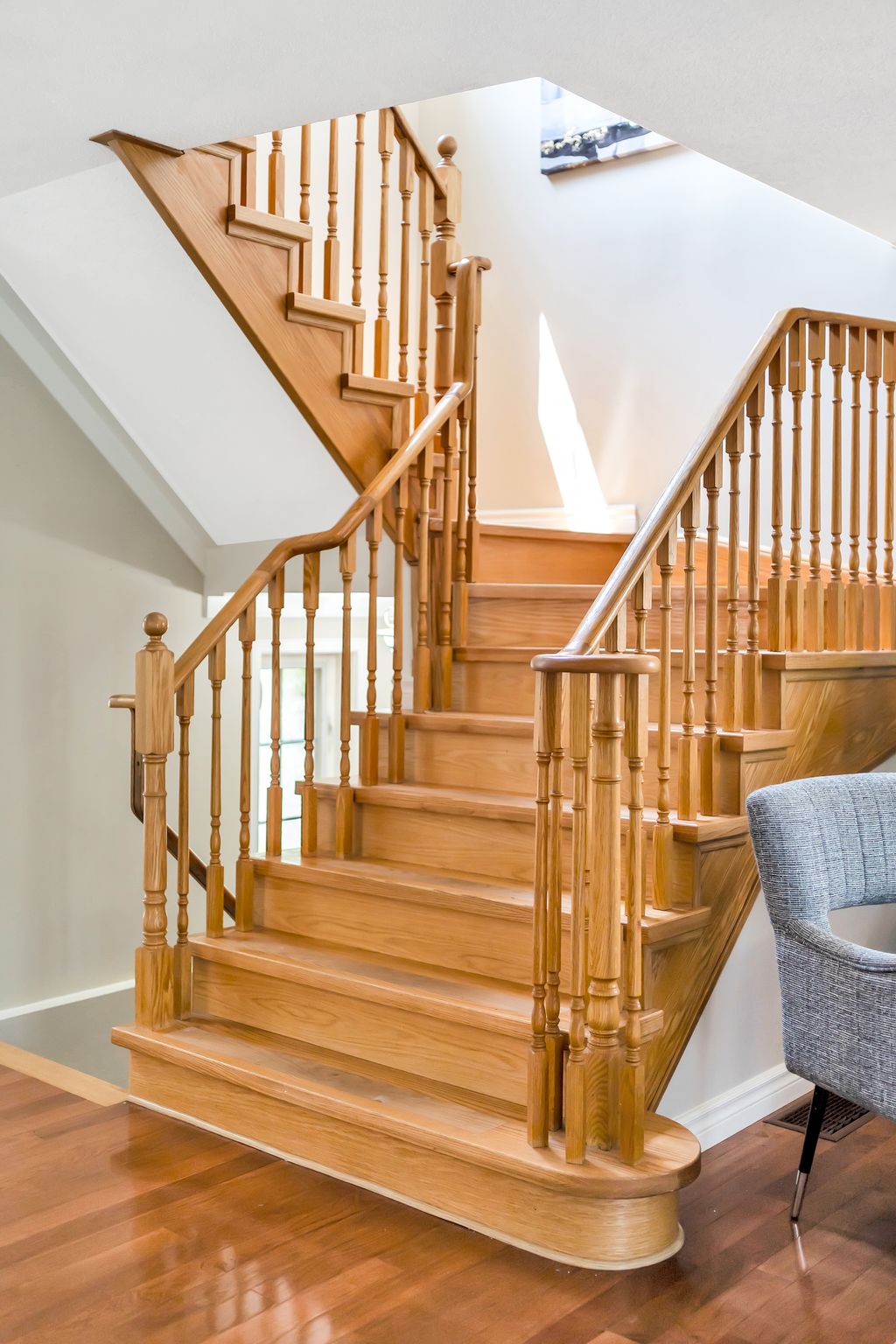 Staircase at 1509 Grandview Street North, Oshawa, with oak treads and hardwood floors