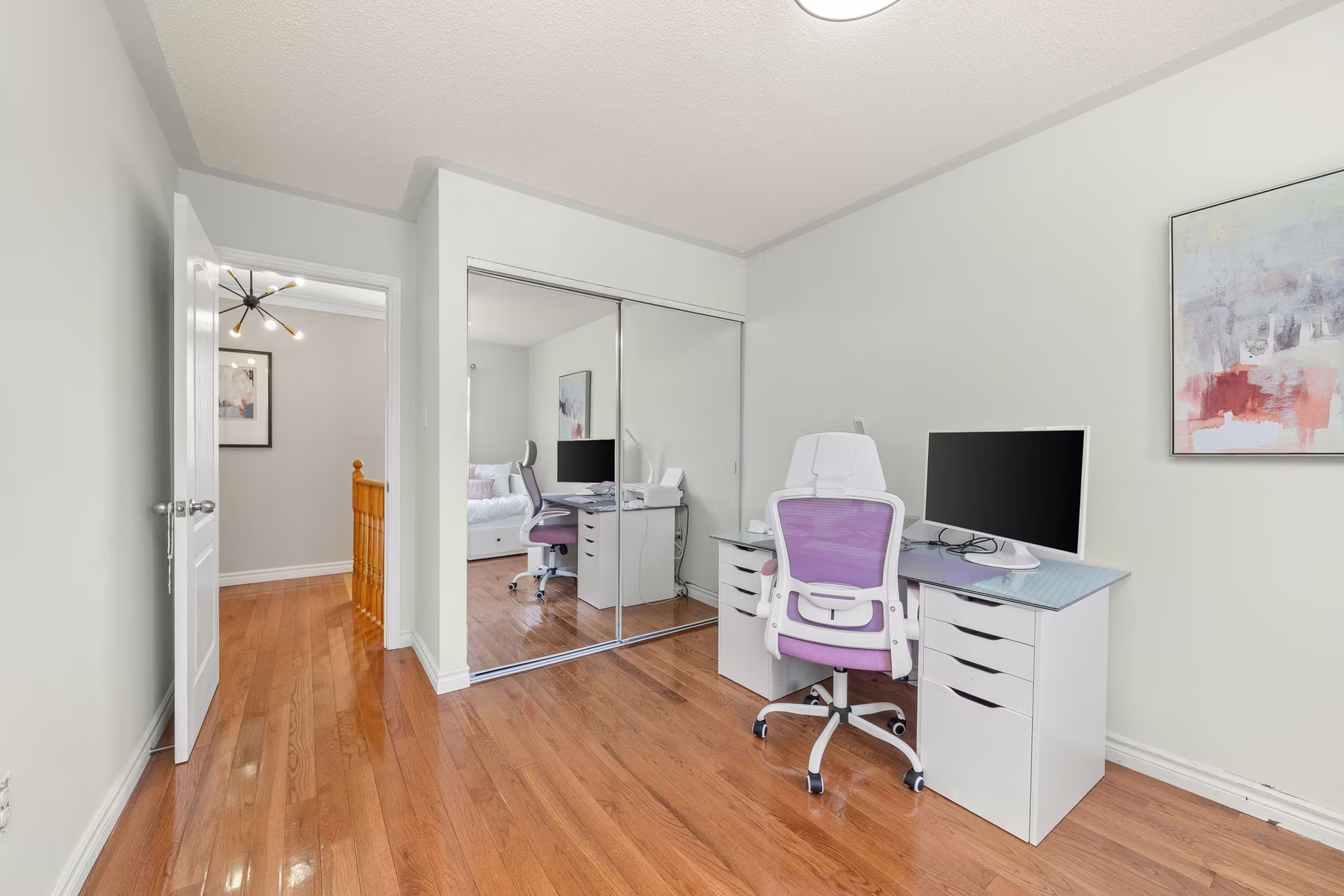 Third bedroom at 1509 Grandview Street North, Oshawa, set up as a home office with a mirrored closet