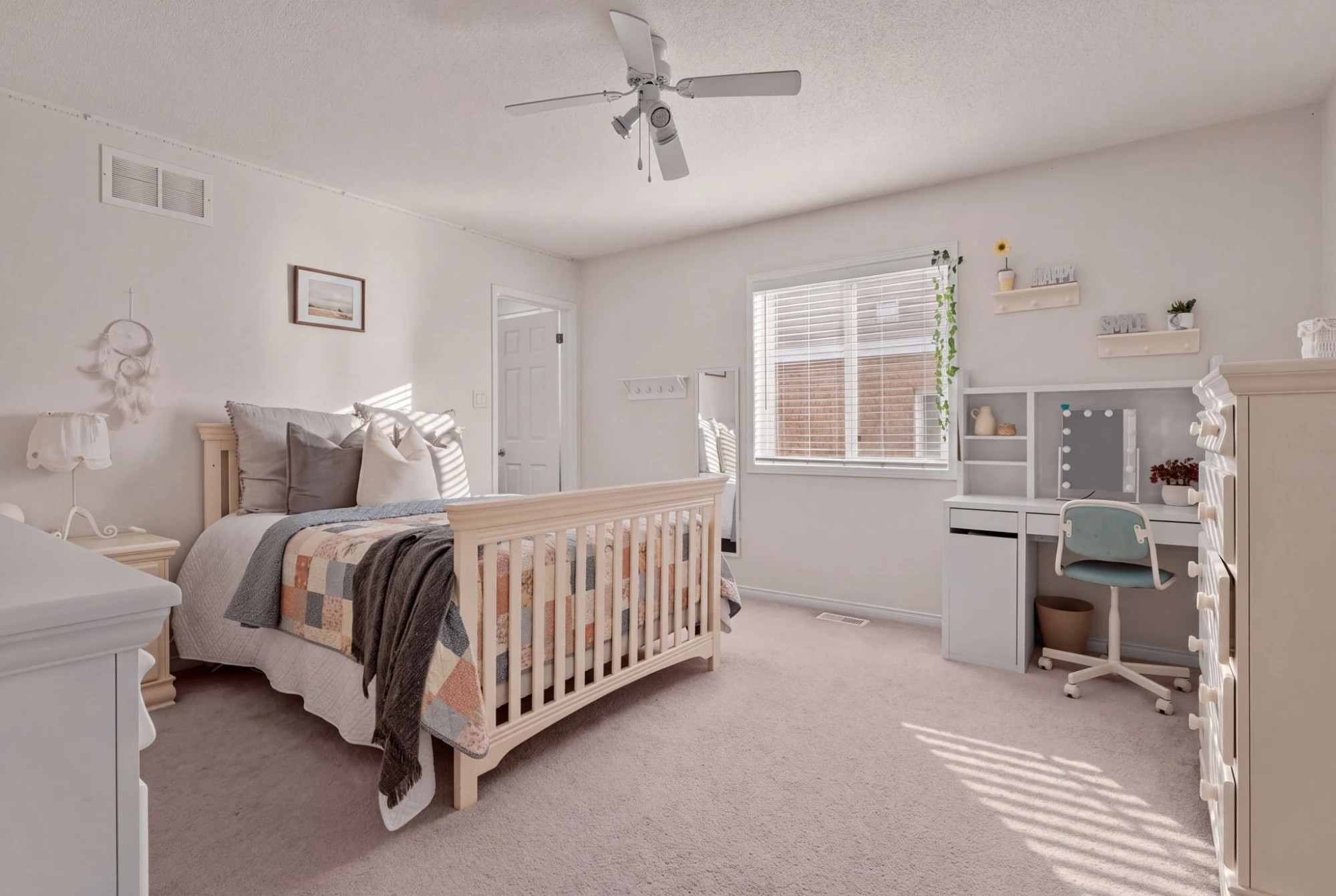 Second bedroom at 1683 Finkle Drive, Oshawa, with a desk and vanity, dresser and window
