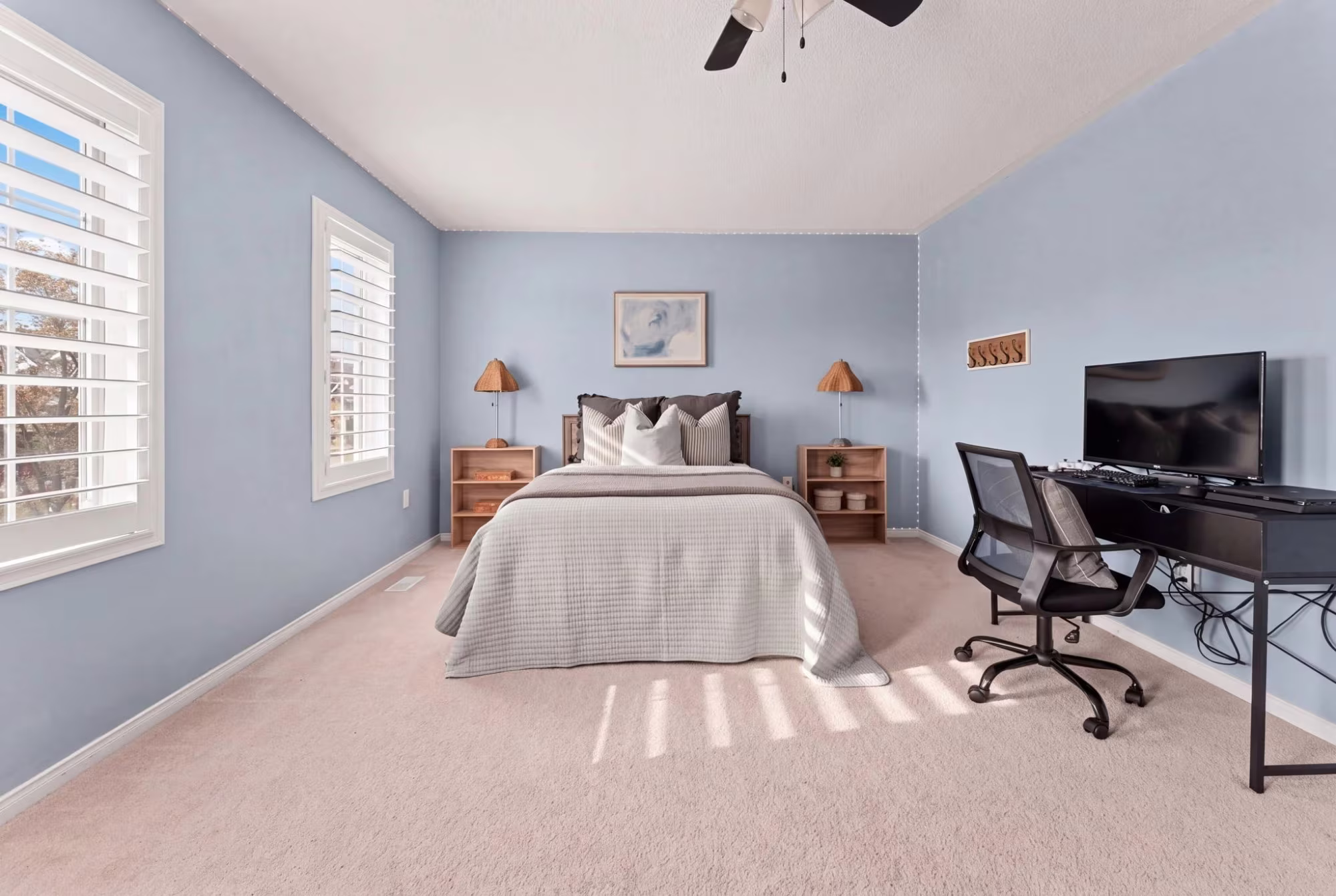 Third bedroom at 1683 Finkle Drive, Oshawa, with a desk area and three large windows