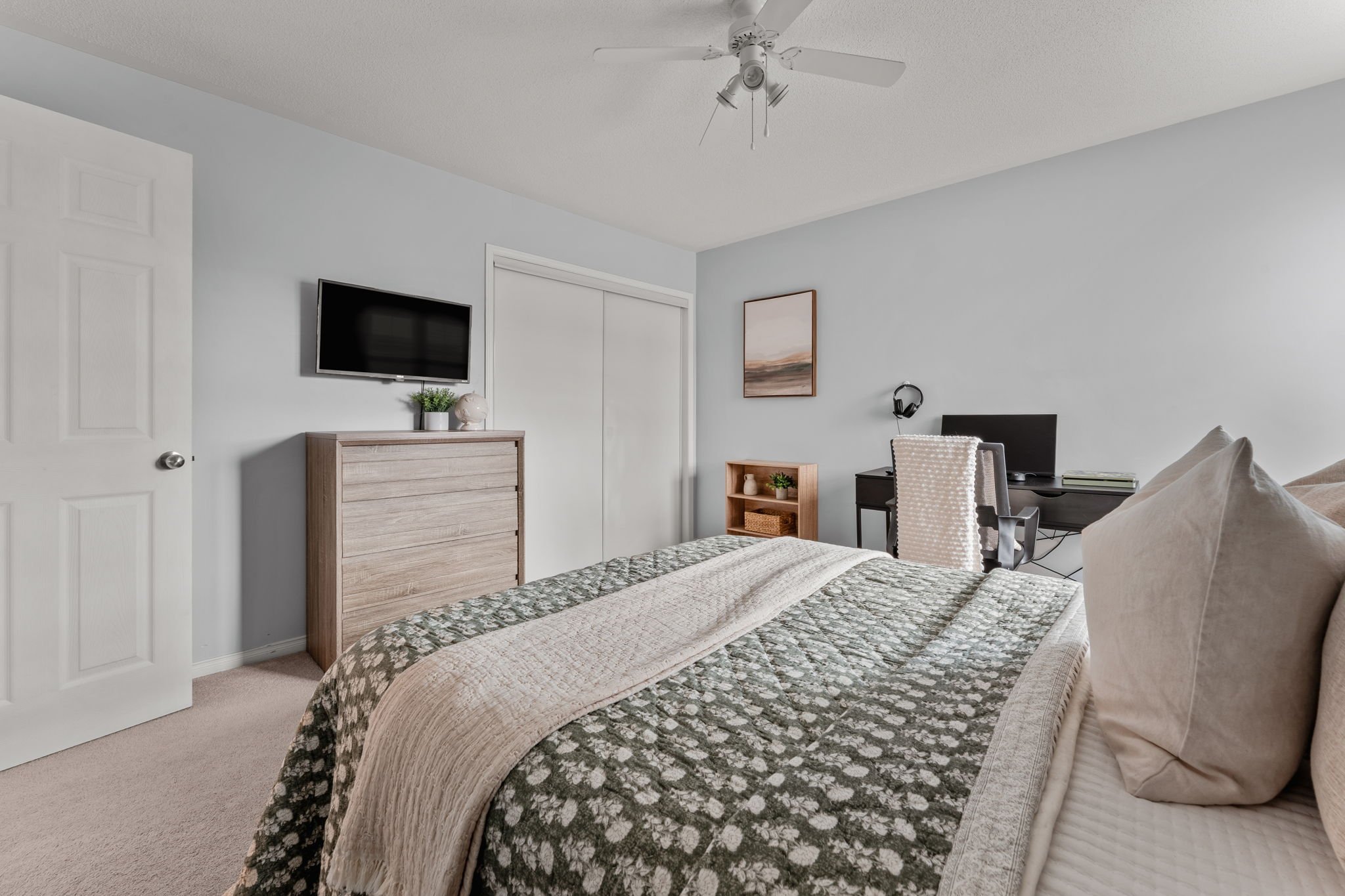 Fourth bedroom desk area at 1683 Finkle Drive, Oshawa, near the upper hallway and staircase