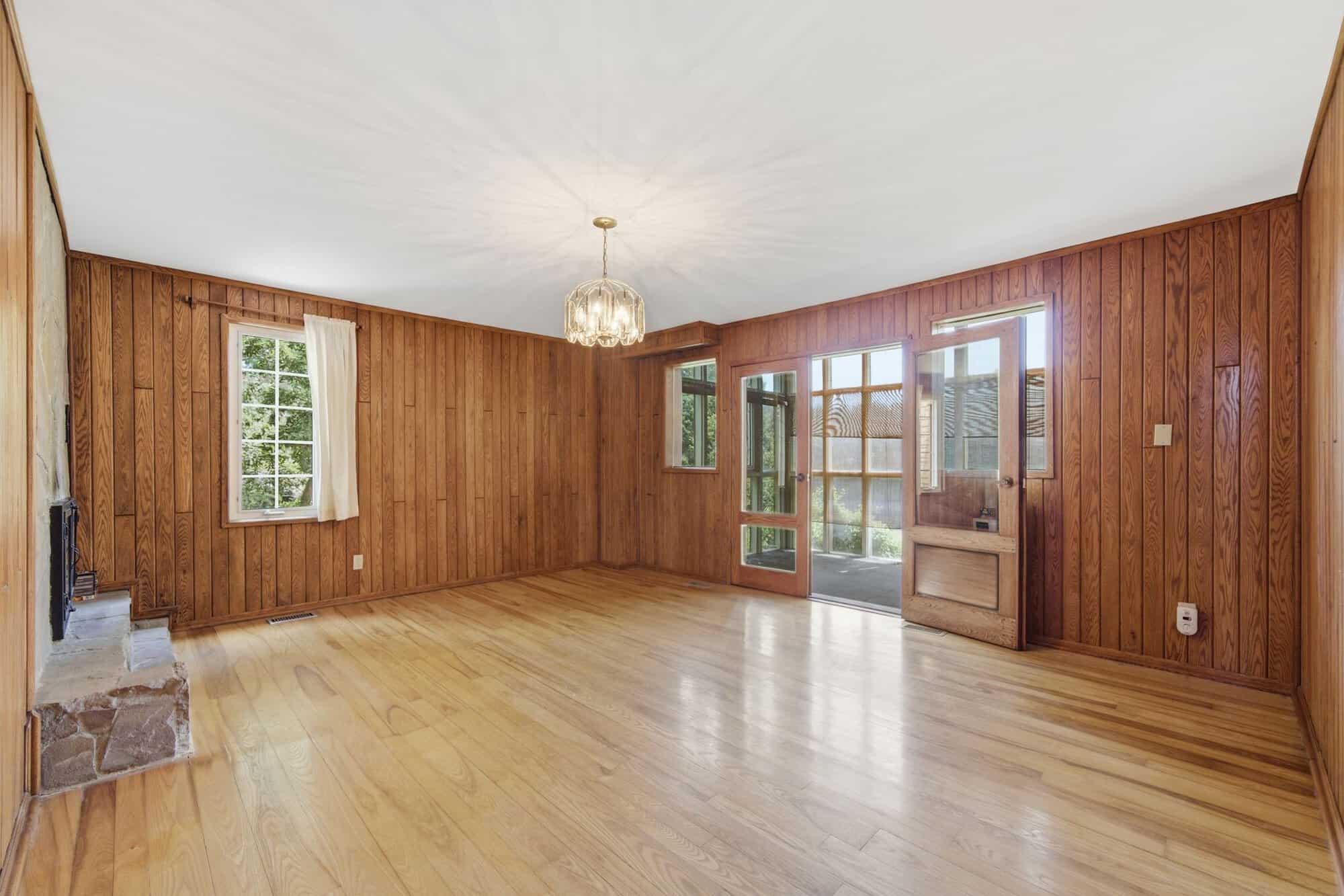 Dining room at 17 Ontoro Blvd, South East Ajax, anchored by a floor-to-ceiling stone fireplace