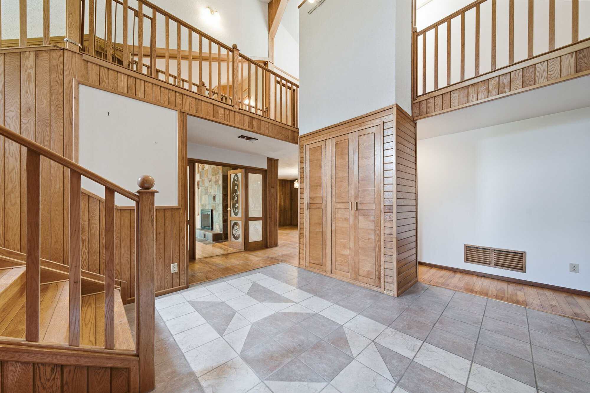 Grand foyer at 17 Ontoro Blvd, South East Ajax, with soaring ceilings and an interior bridge overlooking the entrance