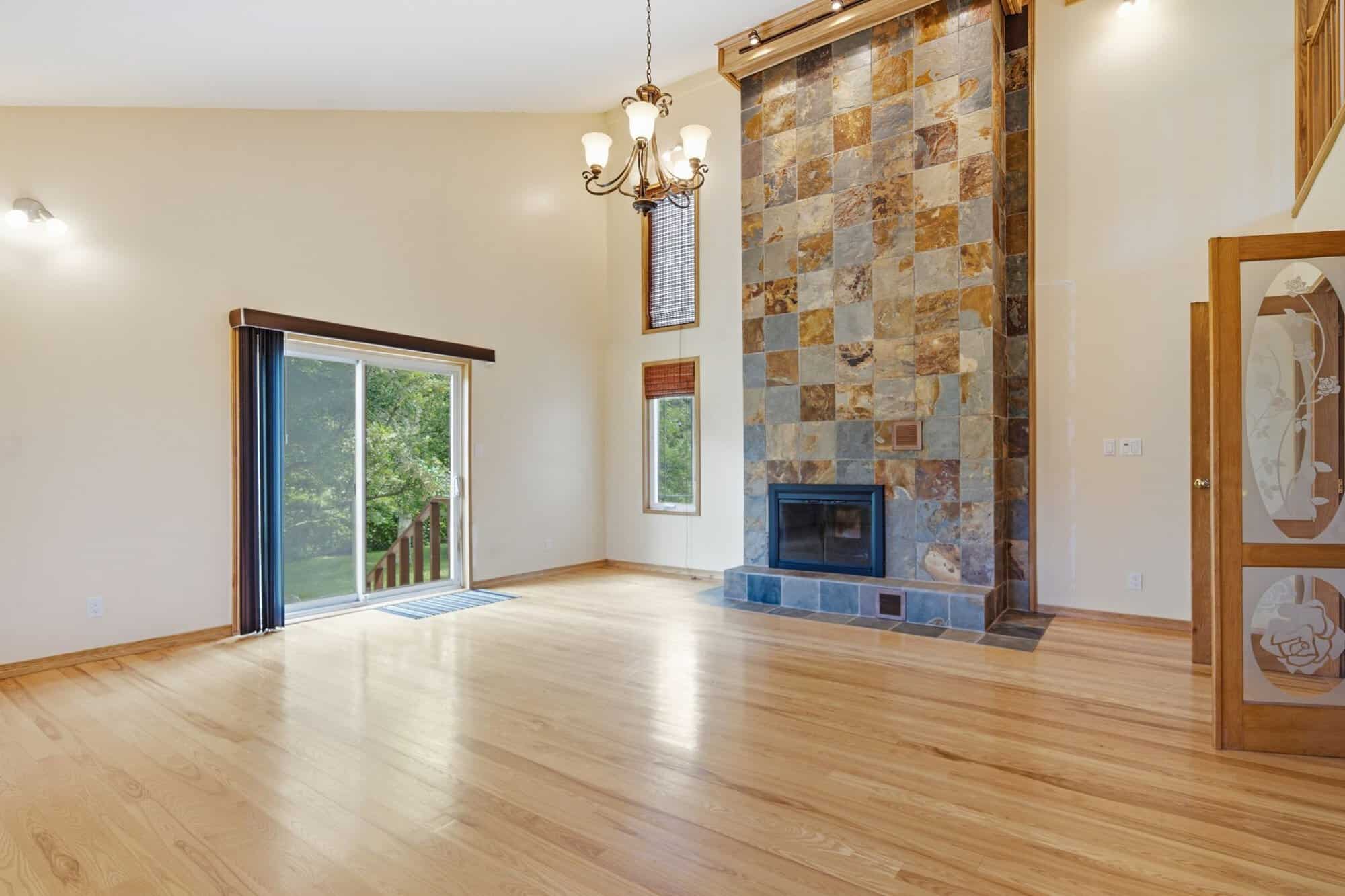 Great room at 17 Ontoro Blvd, South East Ajax, with expansive windows and hardwood floors