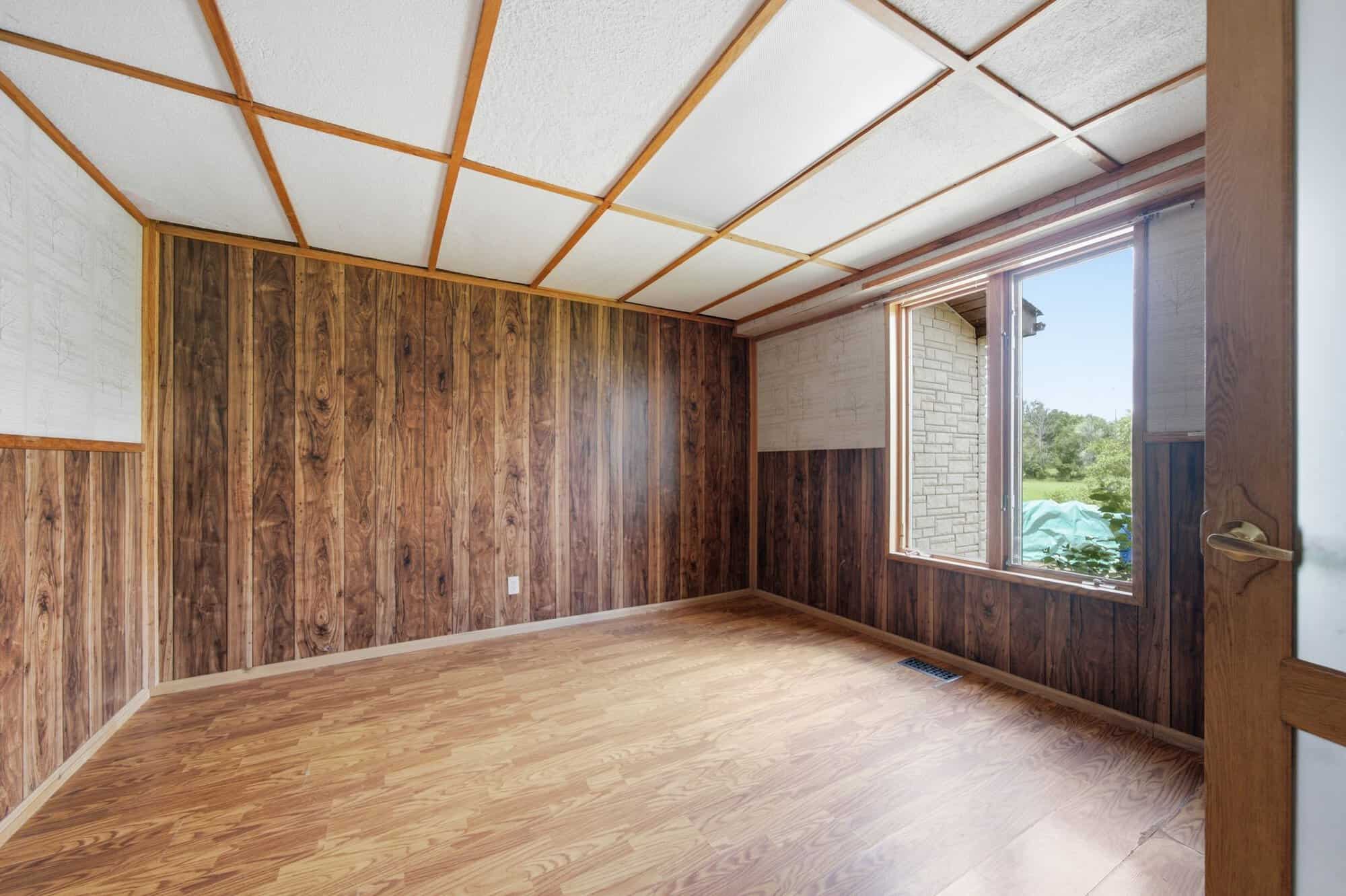 Main-floor office or flex bedroom at 17 Ontoro Blvd, South East Ajax, with etched glass doors