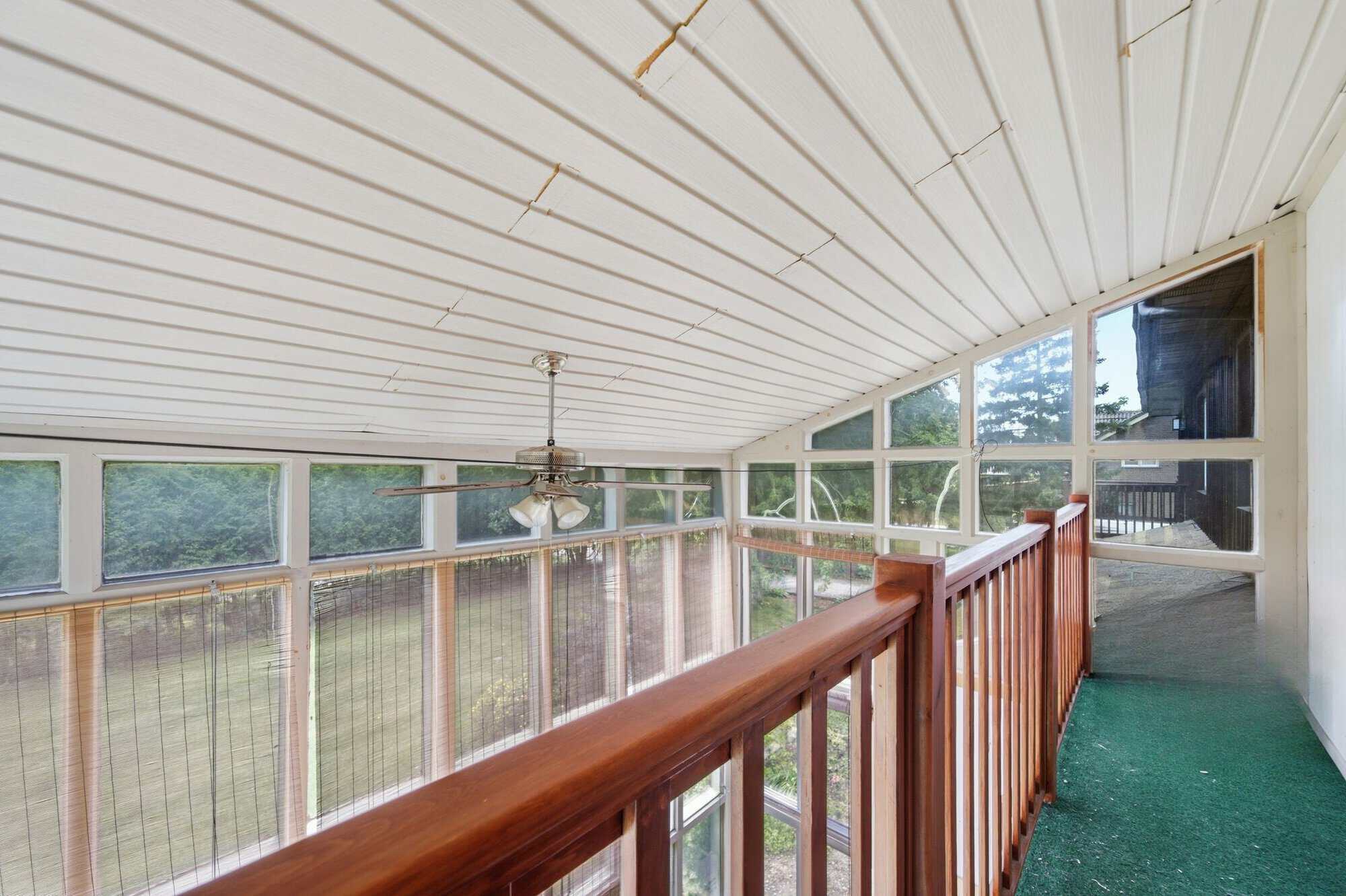 Interior balcony off the secondary bedroom at 17 Ontoro Blvd, South East Ajax, overlooking the conservatory