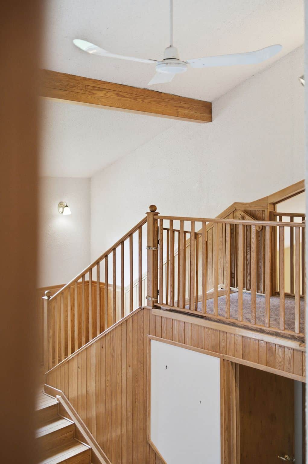 Staircase at 17 Ontoro Blvd, South East Ajax, leading to the upper landing bridge