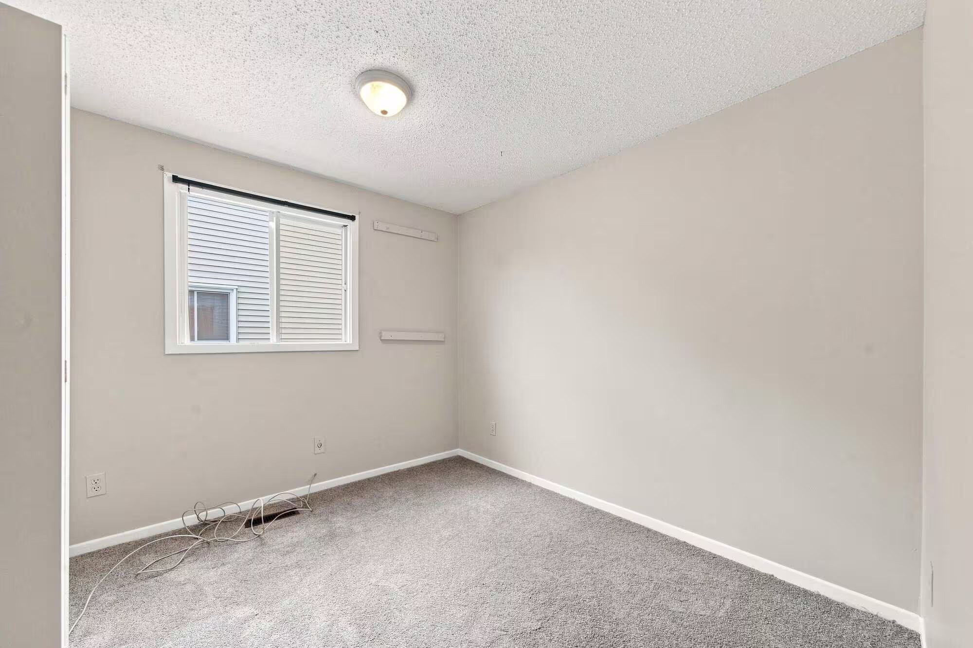 Fourth bedroom at 22 Kipling Cres, South Ajax, shown unstaged with natural light, listed by Laura McBride, Ajax REALTOR®