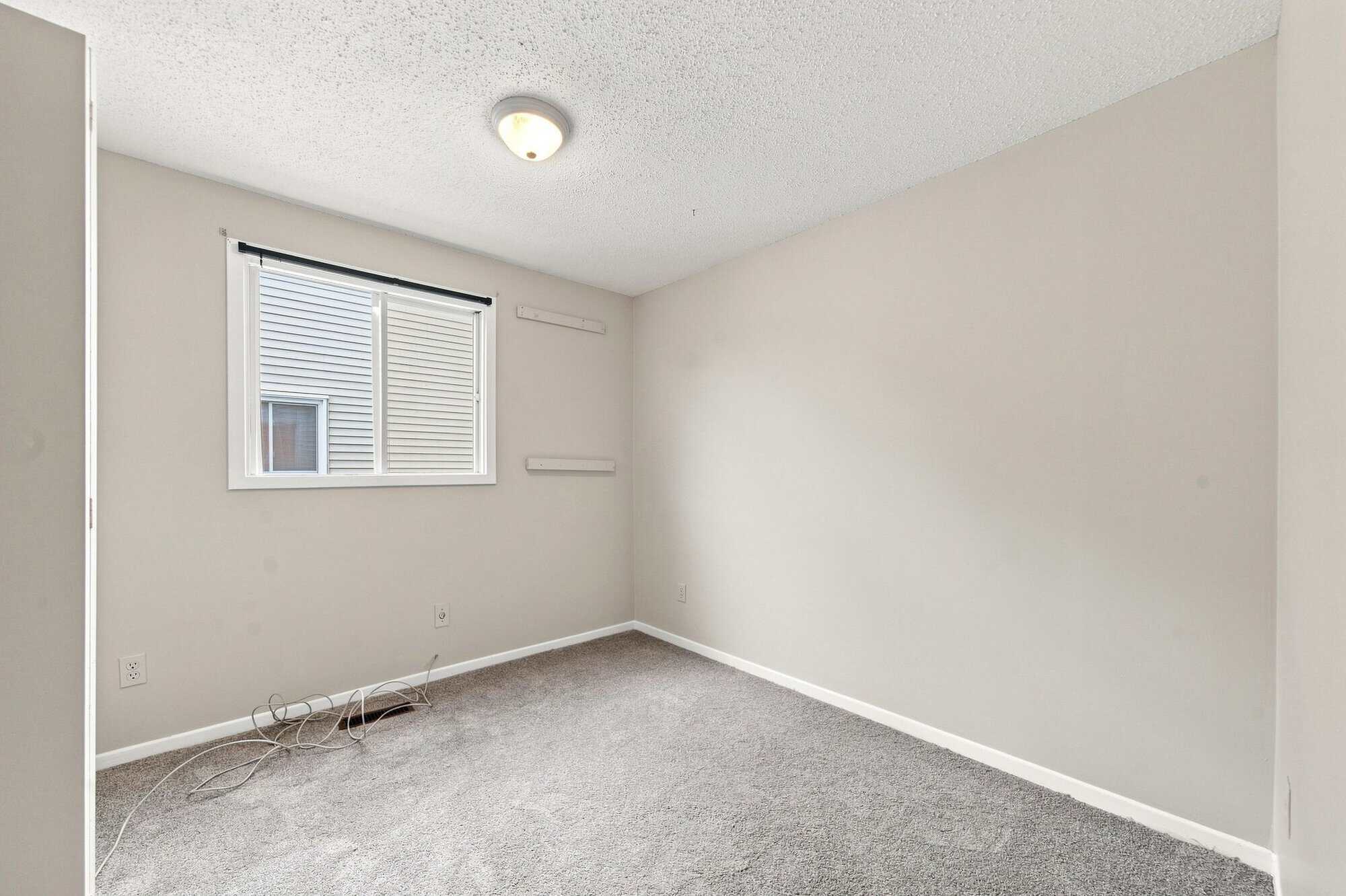 Fourth bedroom at 22 Kipling Cres, South Ajax, shown unstaged with natural light, listed by Laura McBride, Ajax REALTOR®
