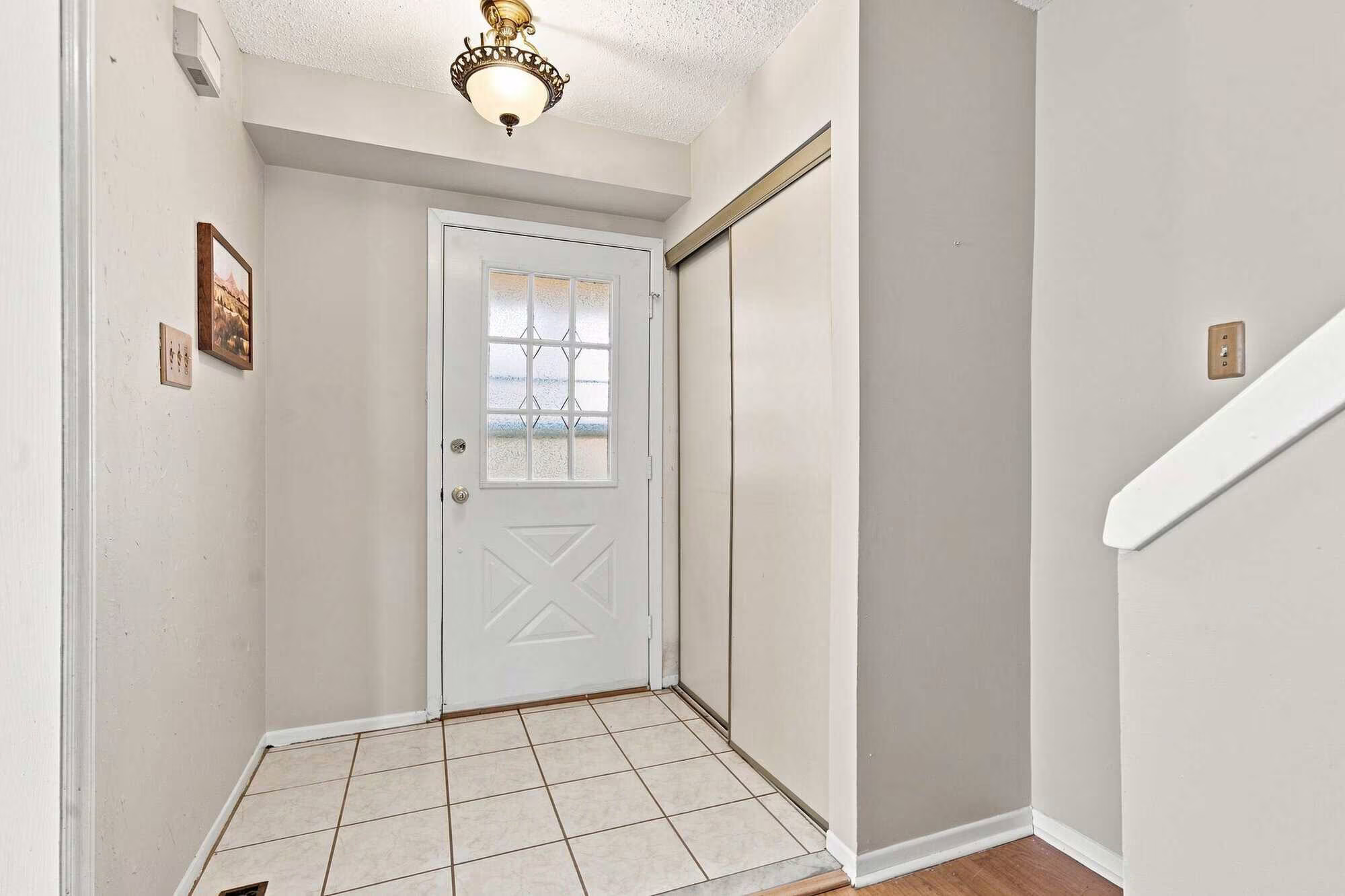 Front foyer at 22 Kipling Cres, South Ajax, with a front hall closet and a clear sightline through the main floor, listed by Laura McBride, Ajax REALTOR®