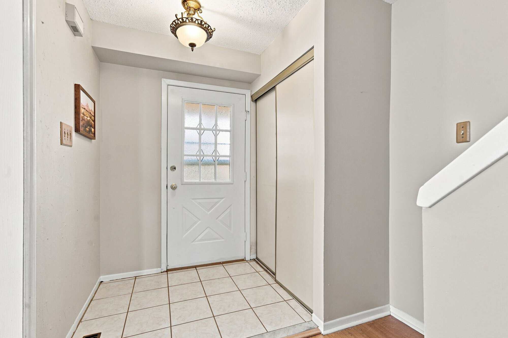 Front foyer at 22 Kipling Cres, South Ajax, with a front hall closet and a clear sightline through the main floor, listed by Laura McBride, Ajax REALTOR®